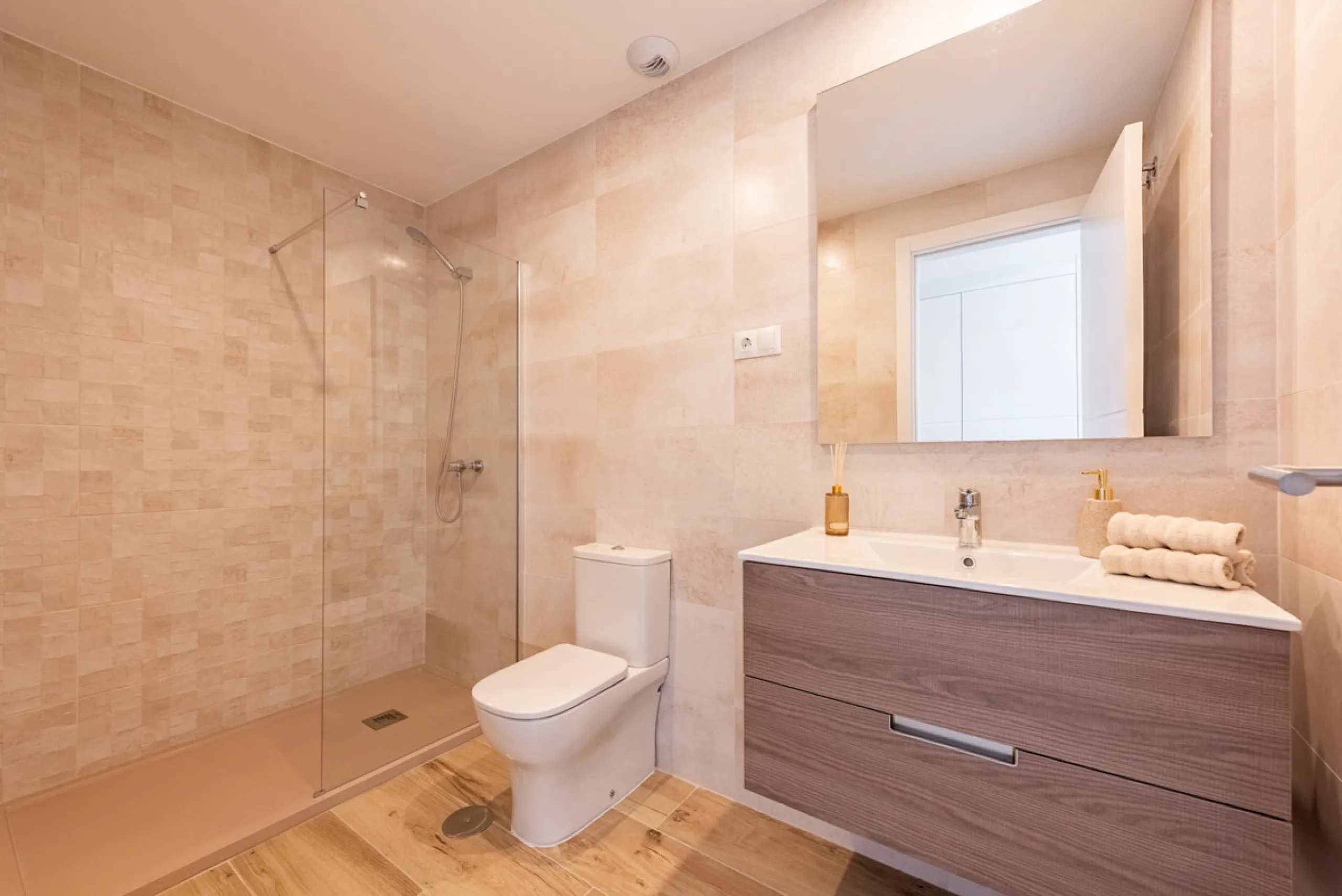 This brand new, never-before-occupied apartment is situated in the prestigious area of Nueva Andalucia, Marbella, Malaga, embodying both luxury and convenience on the renowned Costa Del Sol. Offering three bedrooms and two bathrooms, including an en-suite