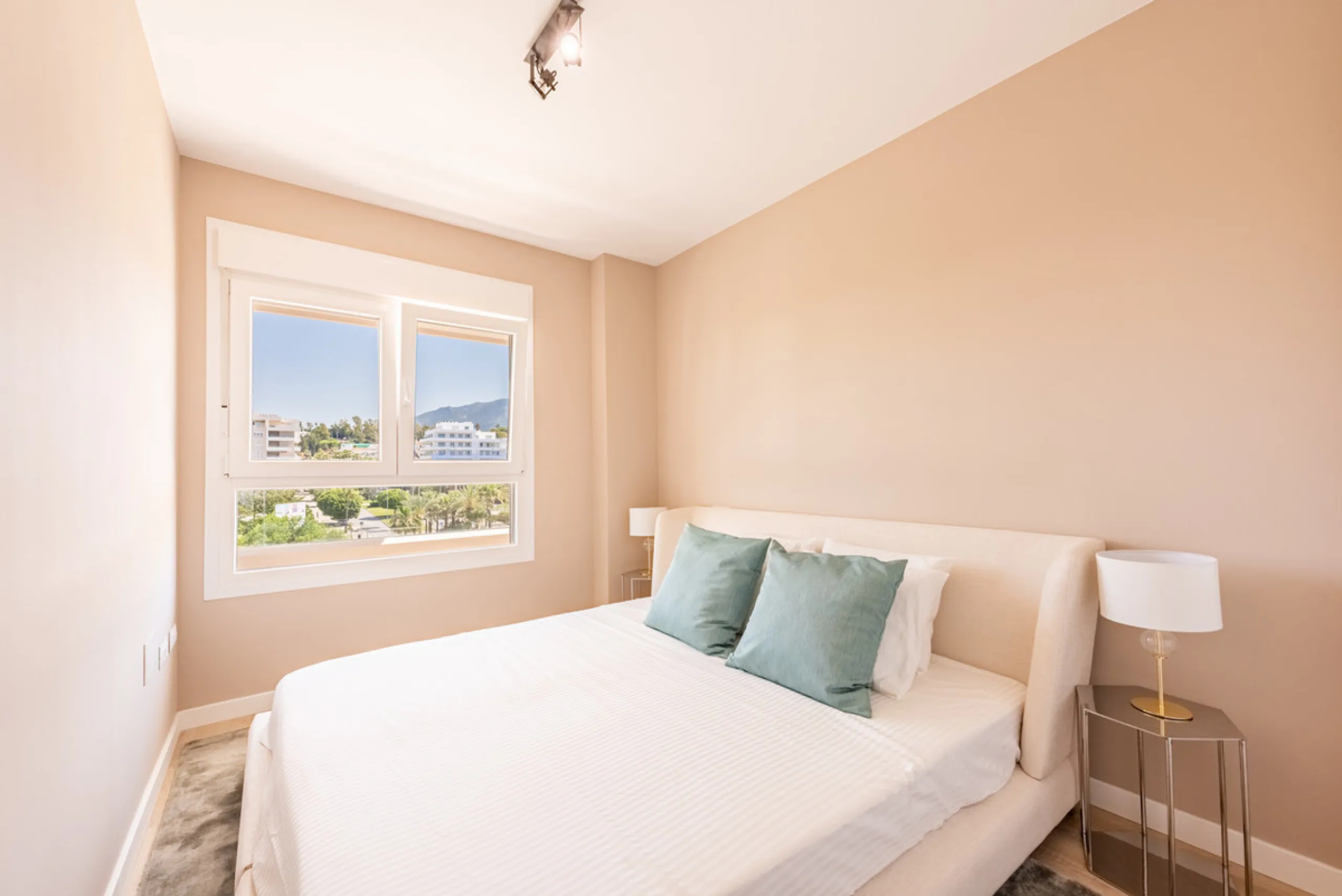 This brand new, never-before-occupied apartment is situated in the prestigious area of Nueva Andalucia, Marbella, Malaga, embodying both luxury and convenience on the renowned Costa Del Sol. Offering three bedrooms and two bathrooms, including an en-suite