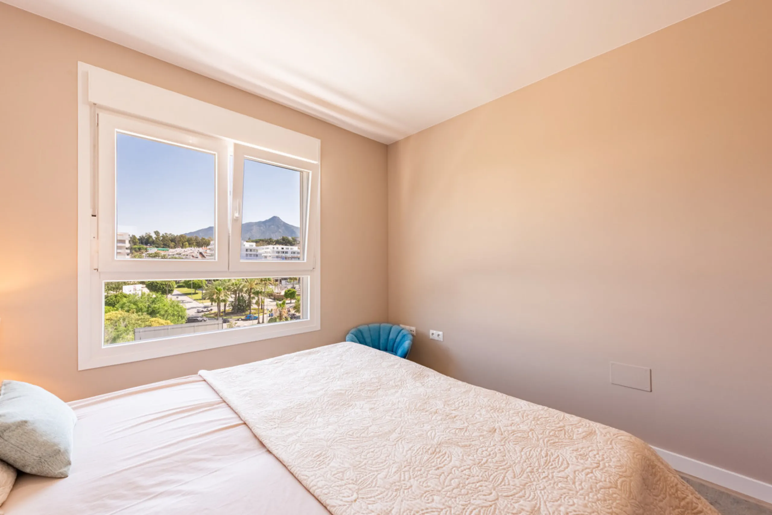 This brand new, never-before-occupied apartment is situated in the prestigious area of Nueva Andalucia, Marbella, Malaga, embodying both luxury and convenience on the renowned Costa Del Sol. Offering three bedrooms and two bathrooms, including an en-suite