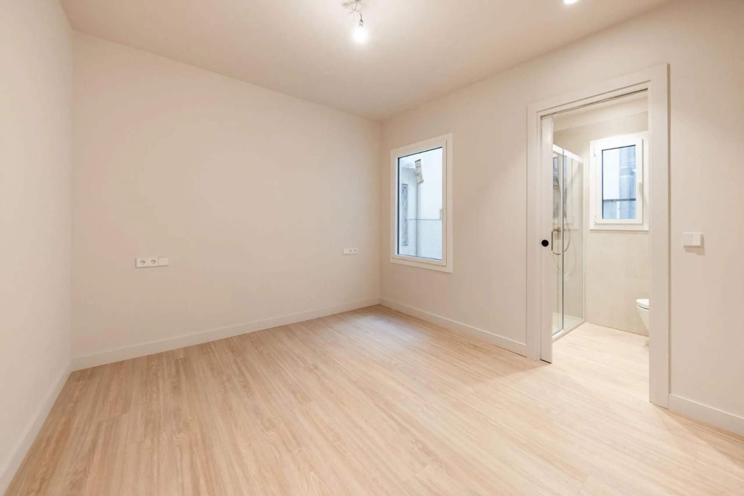 Exclusive renovated apartment with private garden in Barcelona