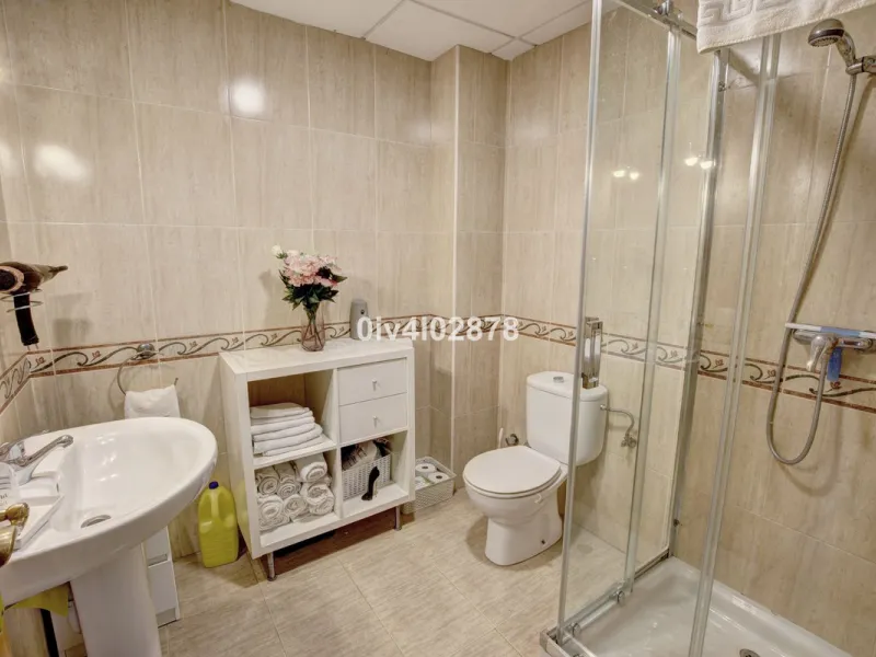 Prime Benalmádena Costa Residence with Guest Apartment, Pool, and Sea Views