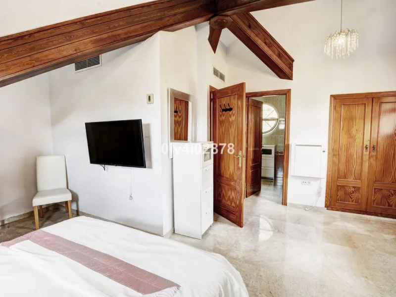 Prime Benalmádena Costa Residence with Guest Apartment, Pool, and Sea Views