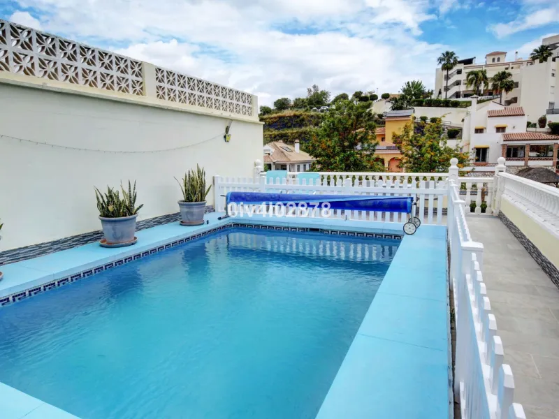 Prime Benalmádena Costa Residence with Guest Apartment, Pool, and Sea Views