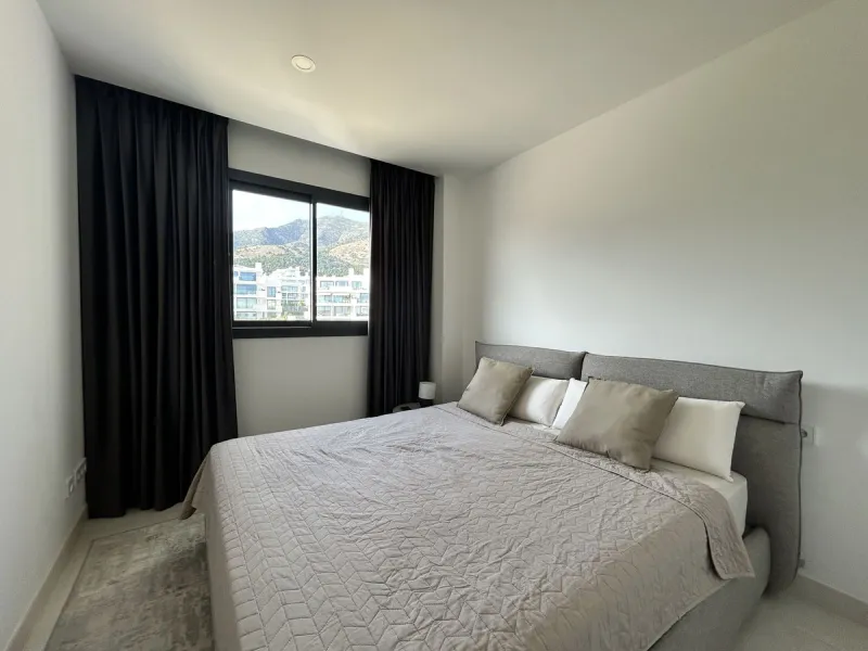 Spacious and bright 2-bedroom apartment for sale with a large terrace and stunning sea views, located in the prestigious Higuerón West development.