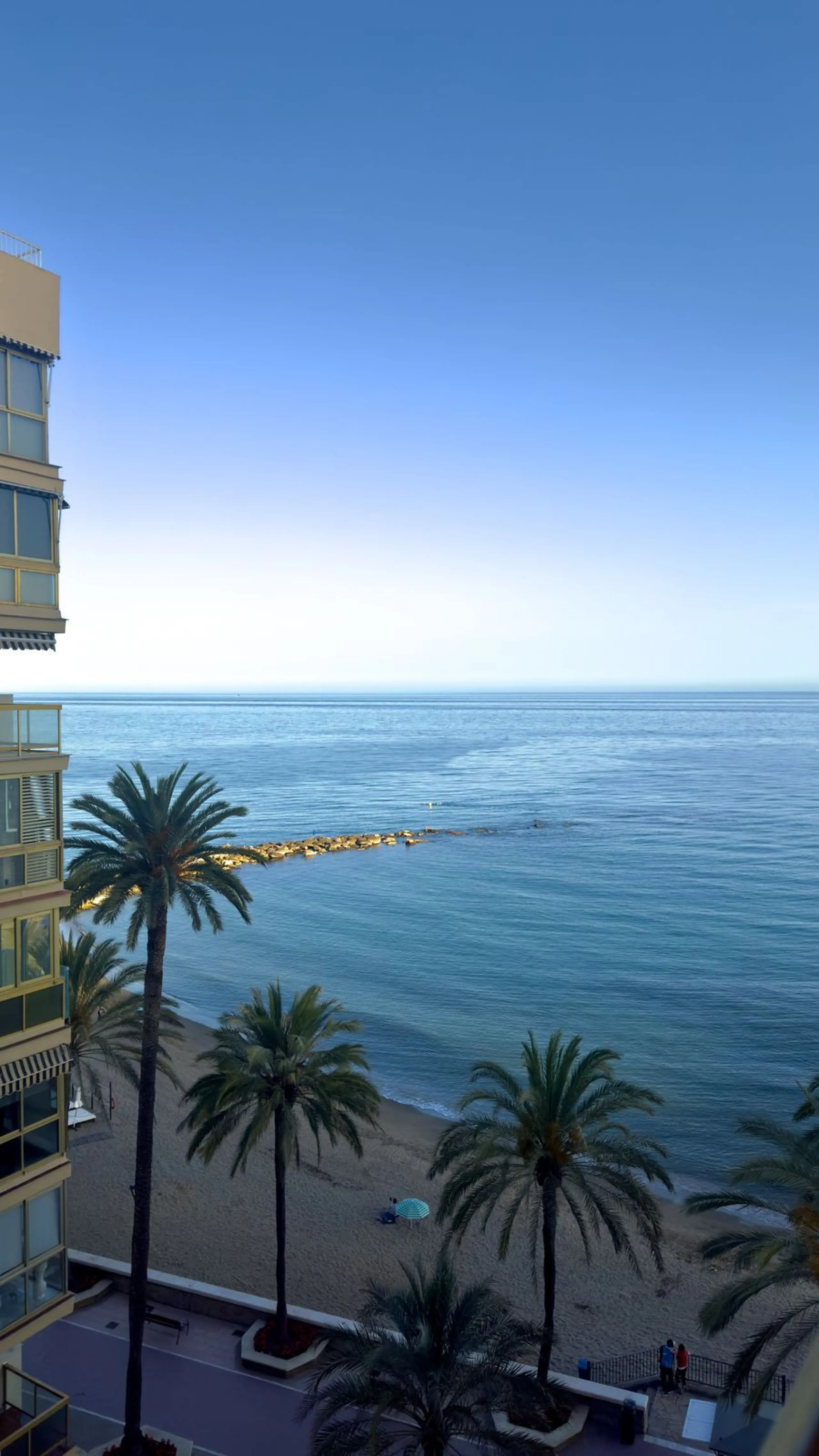 Wake up to the sound of the waves and enjoy Marbella's iconic lifestyle in this beautifully located 1-bedroom apartment, set on the first line of the beach in the very center of town.