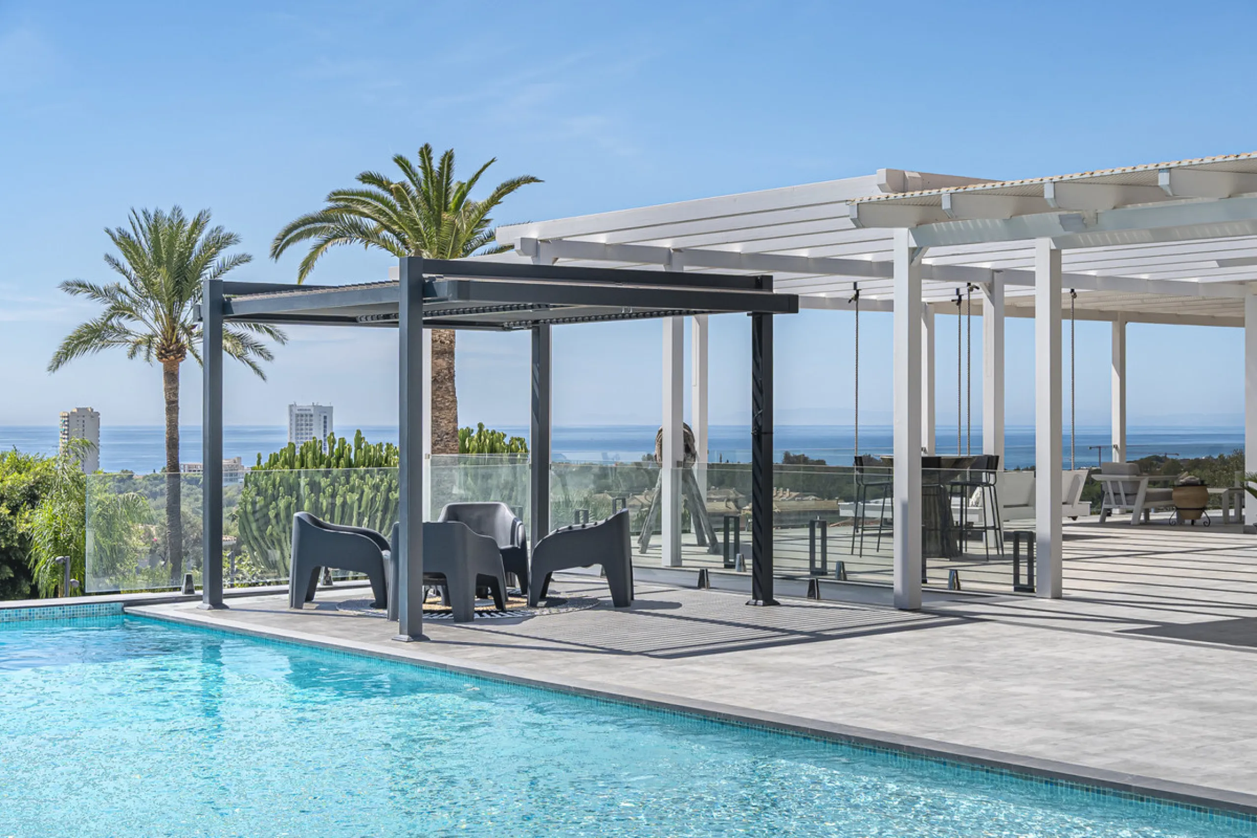 Set on two generous plots totalling 6.128 m², this private and peaceful luxury villa offers a rare blend of modern Mediterranean style and natural beauty in Elviria, Marbella East. Surrounded by its own unspoilt land on one side, the property enjoys excep