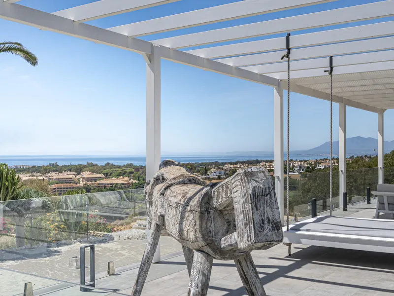 Set on two generous plots totalling 6.128 m², this private and peaceful luxury villa offers a rare blend of modern Mediterranean style and natural beauty in Elviria, Marbella East. Surrounded by its own unspoilt land on one side, the property enjoys excep