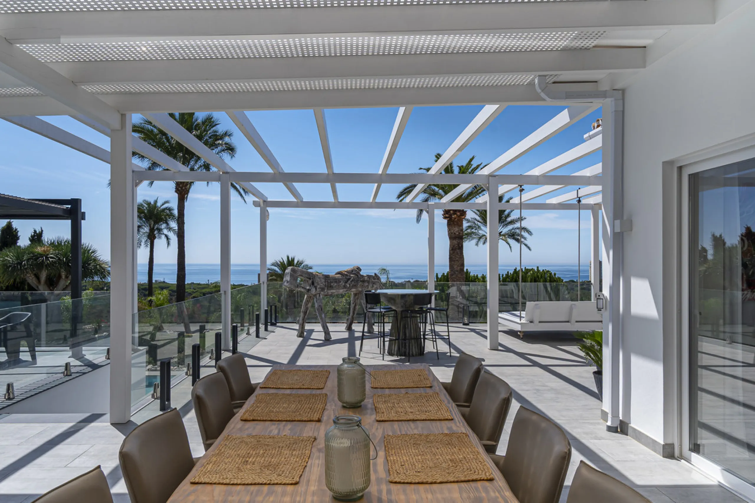 Set on two generous plots totalling 6.128 m², this private and peaceful luxury villa offers a rare blend of modern Mediterranean style and natural beauty in Elviria, Marbella East. Surrounded by its own unspoilt land on one side, the property enjoys excep