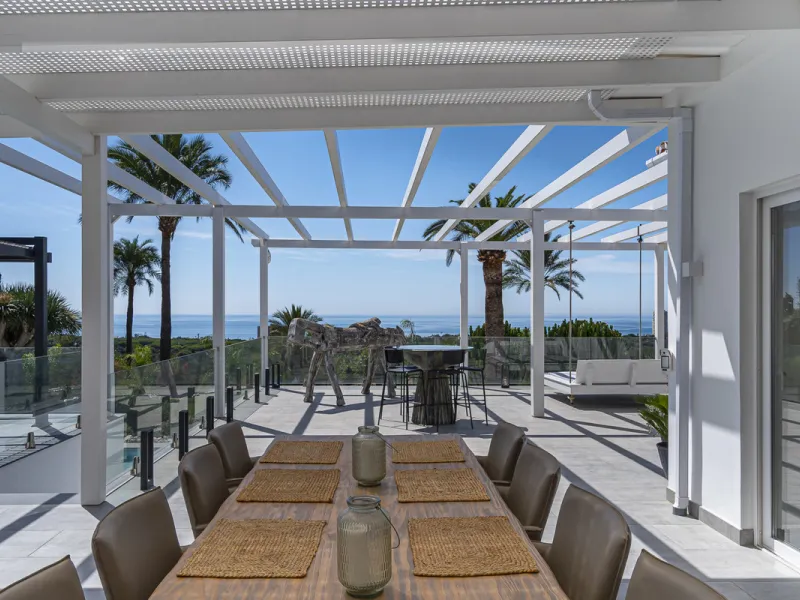 Set on two generous plots totalling 6.128 m², this private and peaceful luxury villa offers a rare blend of modern Mediterranean style and natural beauty in Elviria, Marbella East. Surrounded by its own unspoilt land on one side, the property enjoys excep
