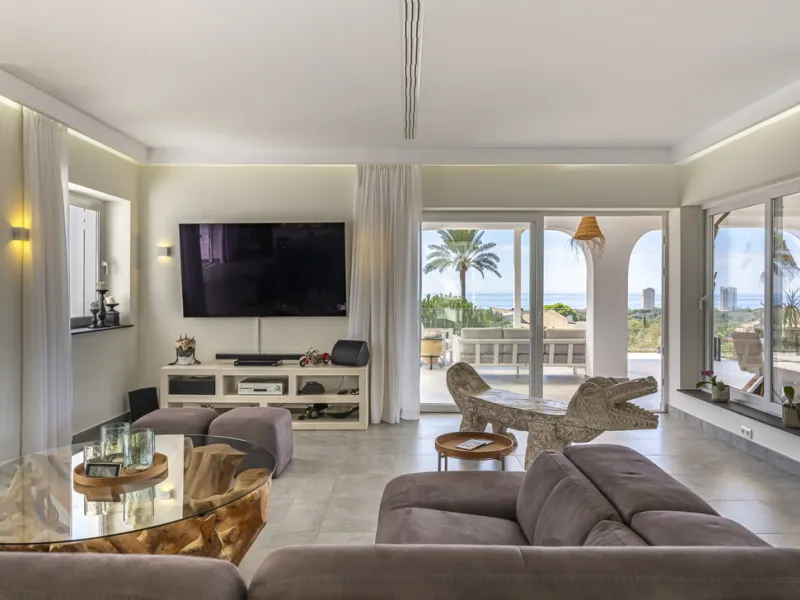 Set on two generous plots totalling 6.128 m², this private and peaceful luxury villa offers a rare blend of modern Mediterranean style and natural beauty in Elviria, Marbella East. Surrounded by its own unspoilt land on one side, the property enjoys excep