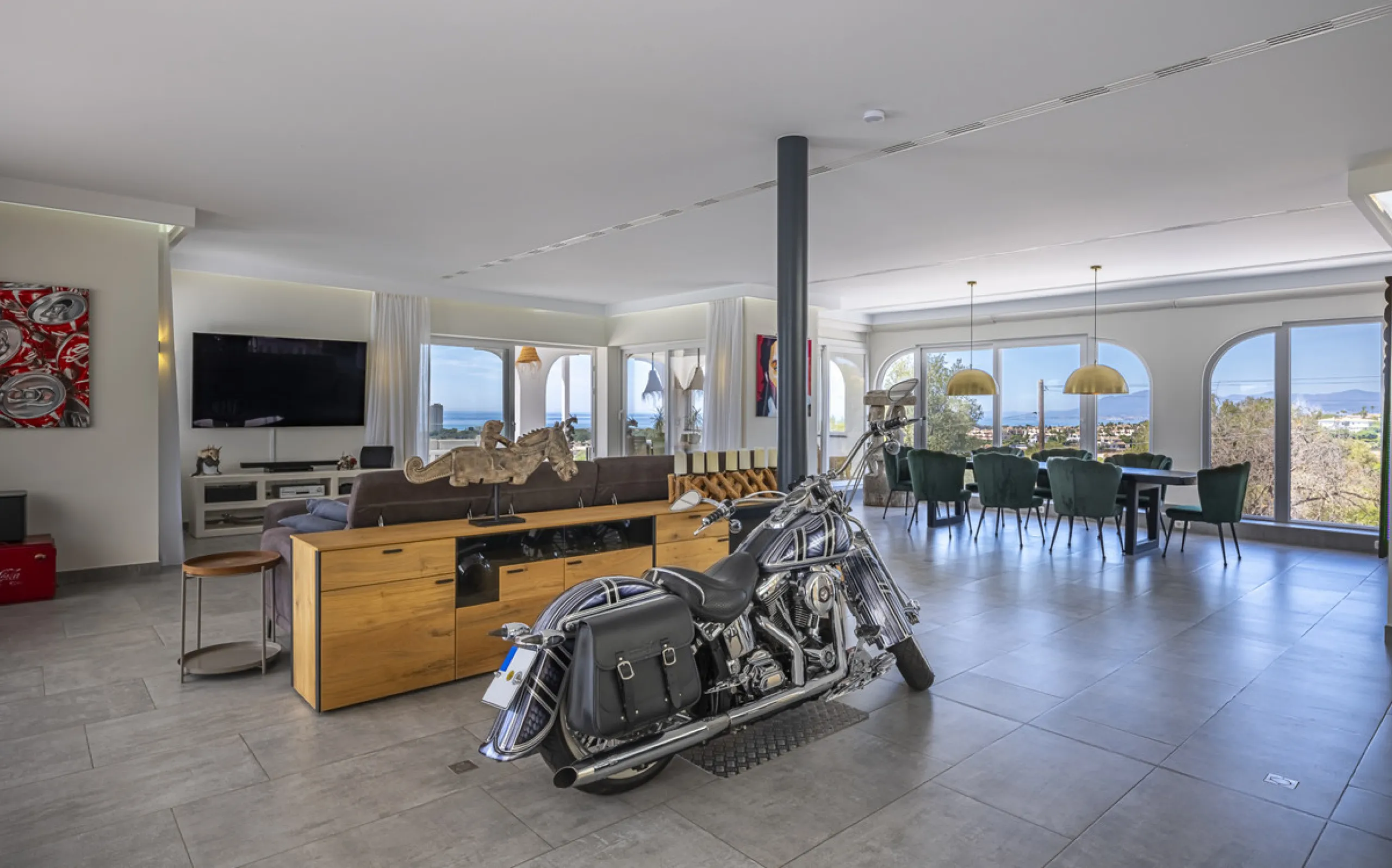 Set on two generous plots totalling 6.128 m², this private and peaceful luxury villa offers a rare blend of modern Mediterranean style and natural beauty in Elviria, Marbella East. Surrounded by its own unspoilt land on one side, the property enjoys excep