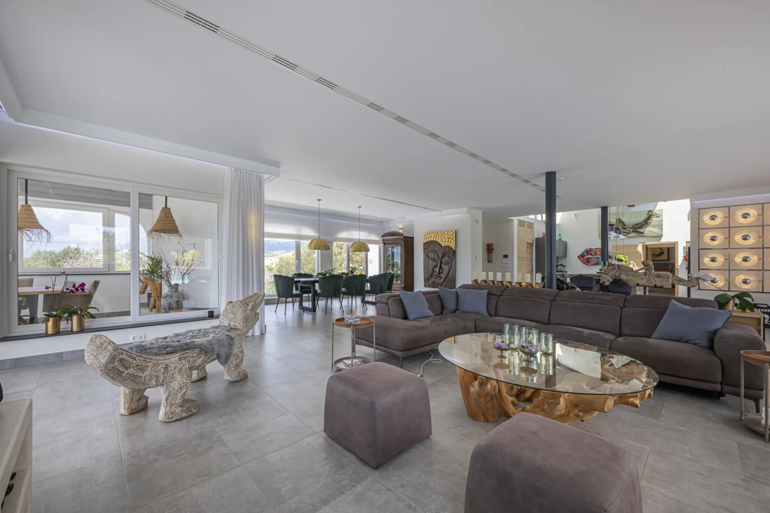 Set on two generous plots totalling 6.128 m², this private and peaceful luxury villa offers a rare blend of modern Mediterranean style and natural beauty in Elviria, Marbella East. Surrounded by its own unspoilt land on one side, the property enjoys excep