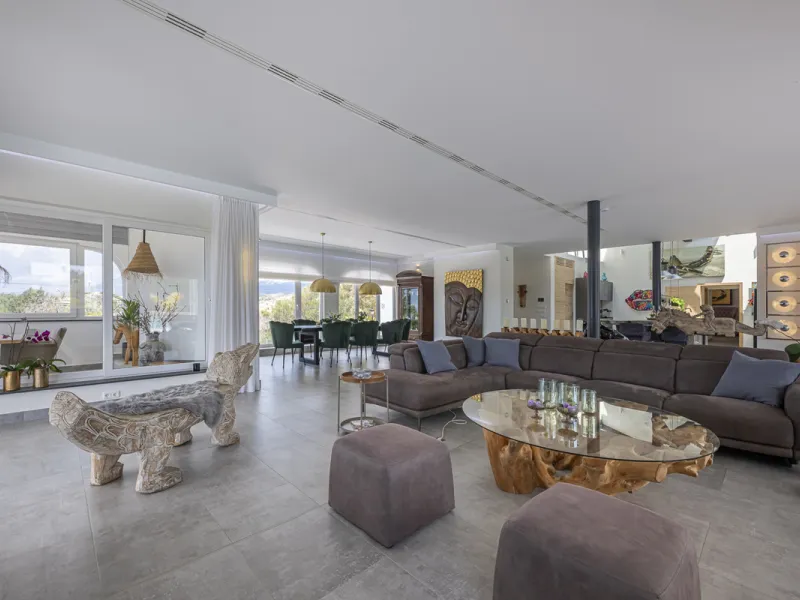Set on two generous plots totalling 6.128 m², this private and peaceful luxury villa offers a rare blend of modern Mediterranean style and natural beauty in Elviria, Marbella East. Surrounded by its own unspoilt land on one side, the property enjoys excep