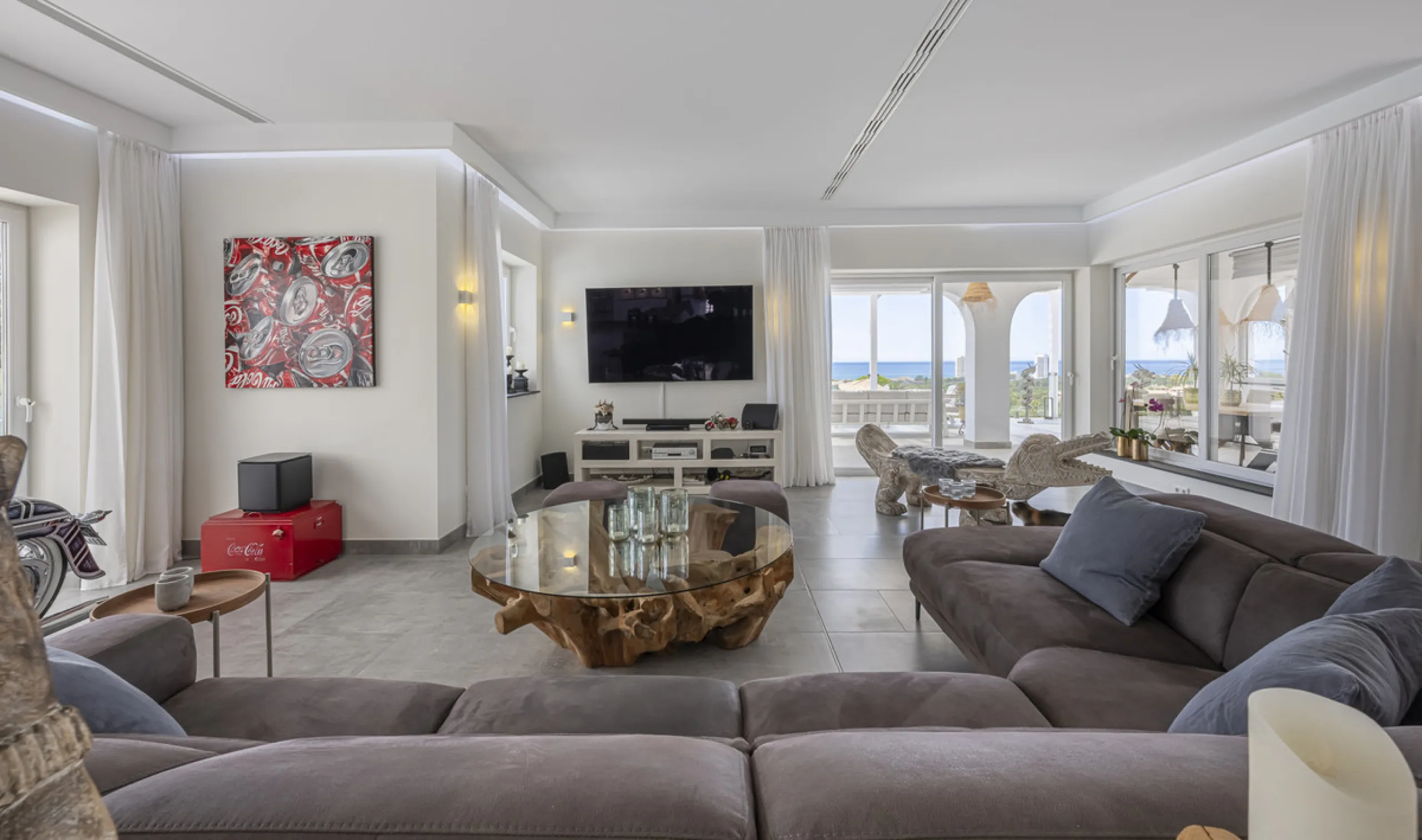 Set on two generous plots totalling 6.128 m², this private and peaceful luxury villa offers a rare blend of modern Mediterranean style and natural beauty in Elviria, Marbella East. Surrounded by its own unspoilt land on one side, the property enjoys excep