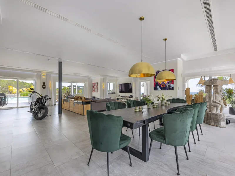 Set on two generous plots totalling 6.128 m², this private and peaceful luxury villa offers a rare blend of modern Mediterranean style and natural beauty in Elviria, Marbella East. Surrounded by its own unspoilt land on one side, the property enjoys excep