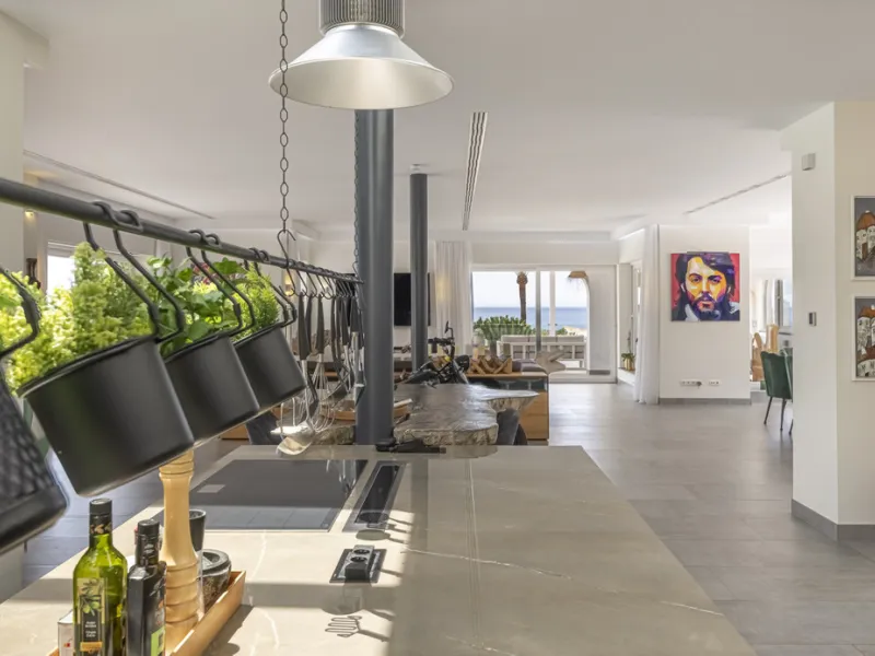 Set on two generous plots totalling 6.128 m², this private and peaceful luxury villa offers a rare blend of modern Mediterranean style and natural beauty in Elviria, Marbella East. Surrounded by its own unspoilt land on one side, the property enjoys excep