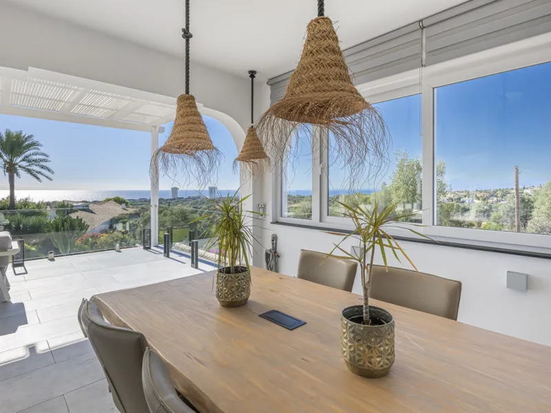 Set on two generous plots totalling 6.128 m², this private and peaceful luxury villa offers a rare blend of modern Mediterranean style and natural beauty in Elviria, Marbella East. Surrounded by its own unspoilt land on one side, the property enjoys excep
