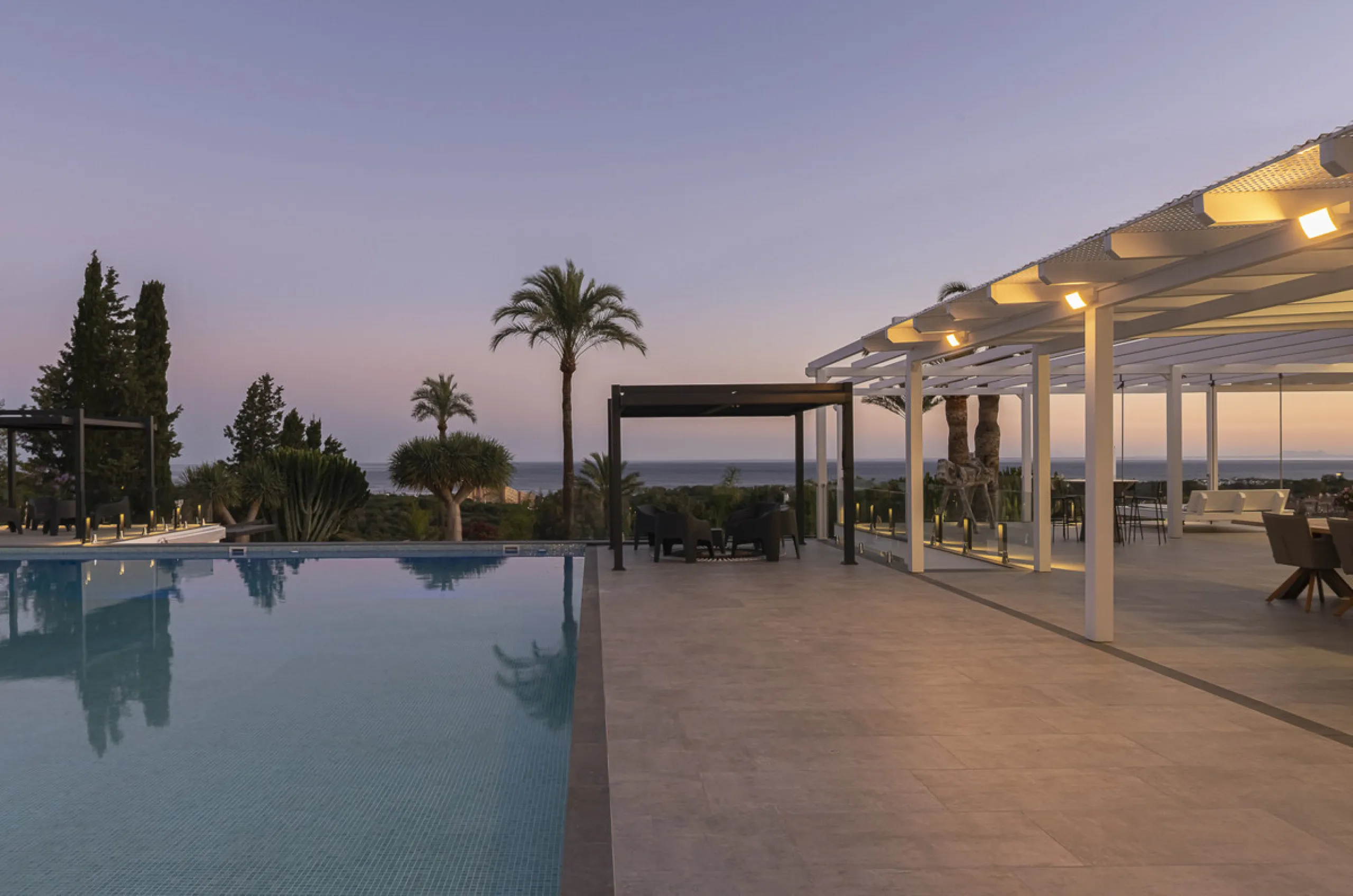Set on two generous plots totalling 6.128 m², this private and peaceful luxury villa offers a rare blend of modern Mediterranean style and natural beauty in Elviria, Marbella East. Surrounded by its own unspoilt land on one side, the property enjoys excep