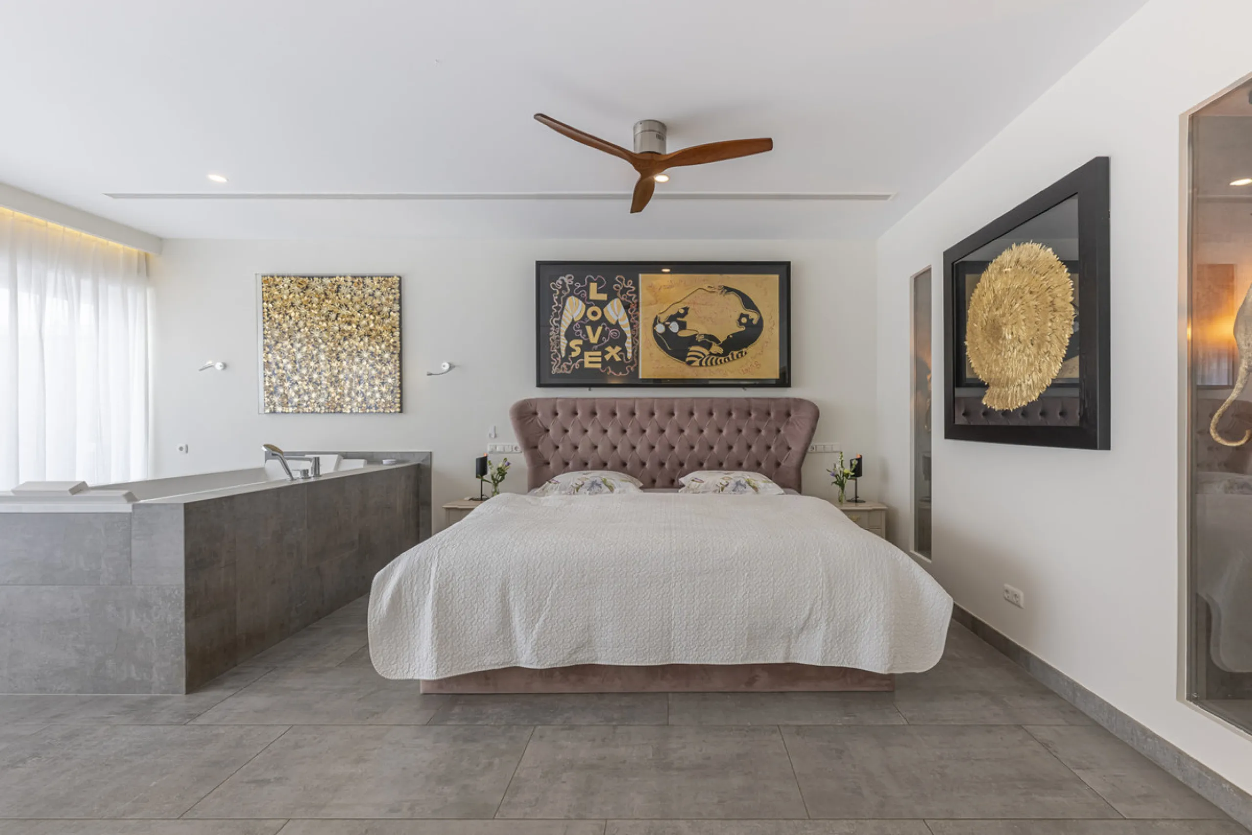 Set on two generous plots totalling 6.128 m², this private and peaceful luxury villa offers a rare blend of modern Mediterranean style and natural beauty in Elviria, Marbella East. Surrounded by its own unspoilt land on one side, the property enjoys excep