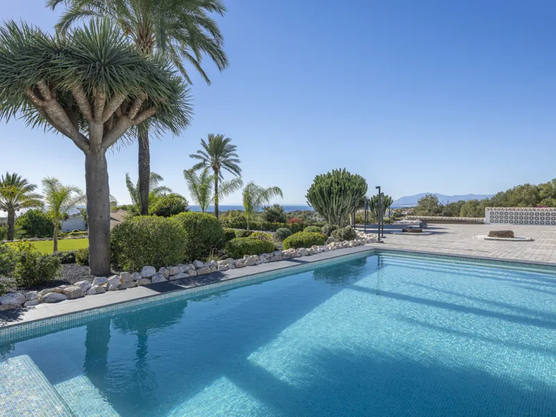 Set on two generous plots totalling 6.128 m², this private and peaceful luxury villa offers a rare blend of modern Mediterranean style and natural beauty in Elviria, Marbella East. Surrounded by its own unspoilt land on one side, the property enjoys excep