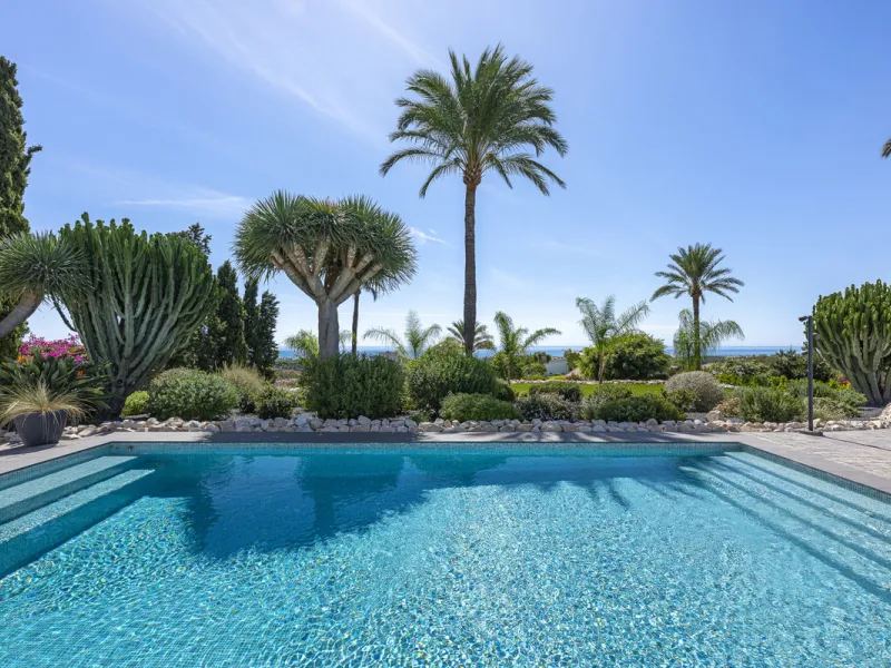 Set on two generous plots totalling 6.128 m², this private and peaceful luxury villa offers a rare blend of modern Mediterranean style and natural beauty in Elviria, Marbella East. Surrounded by its own unspoilt land on one side, the property enjoys excep