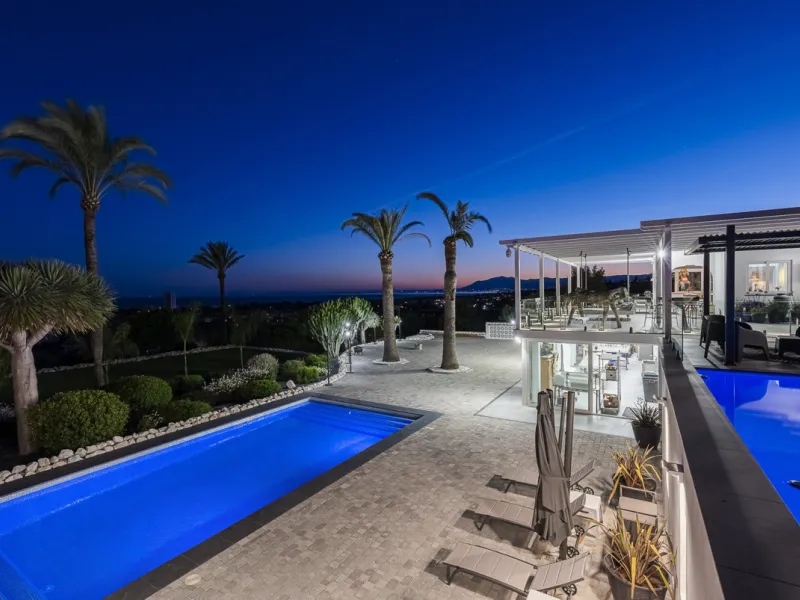 Set on two generous plots totalling 6.128 m², this private and peaceful luxury villa offers a rare blend of modern Mediterranean style and natural beauty in Elviria, Marbella East. Surrounded by its own unspoilt land on one side, the property enjoys excep