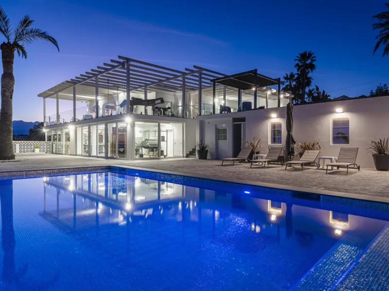 Set on two generous plots totalling 6.128 m², this private and peaceful luxury villa offers a rare blend of modern Mediterranean style and natural beauty in Elviria, Marbella East. Surrounded by its own unspoilt land on one side, the property enjoys excep