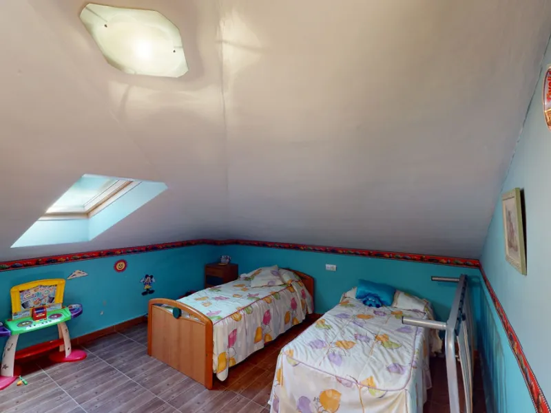 This well-located spacious villa offers the possibility for two families to live separately. The garage of 217 m2 has room for 5 cars, an office and storage space. Entrance to the garden with nice pool, shower, fruit trees and henhouse. Separate room with