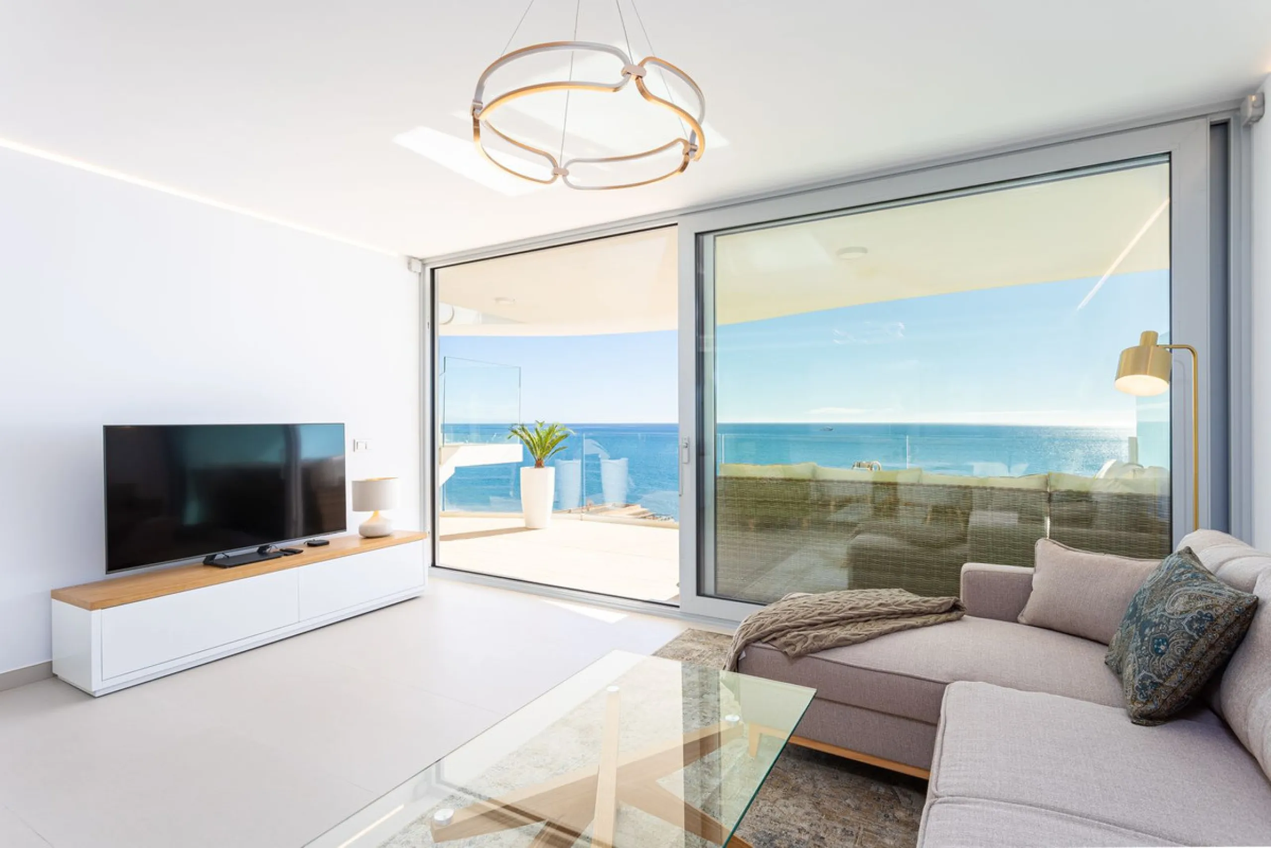 Would you like to live just few steps from the beach, feel the waves at your terrace and enjoy your own roof top solarium, look over the rooftops and feel the sea breeze? This exclusive penthouse apartment is located in one of the finest new builds called