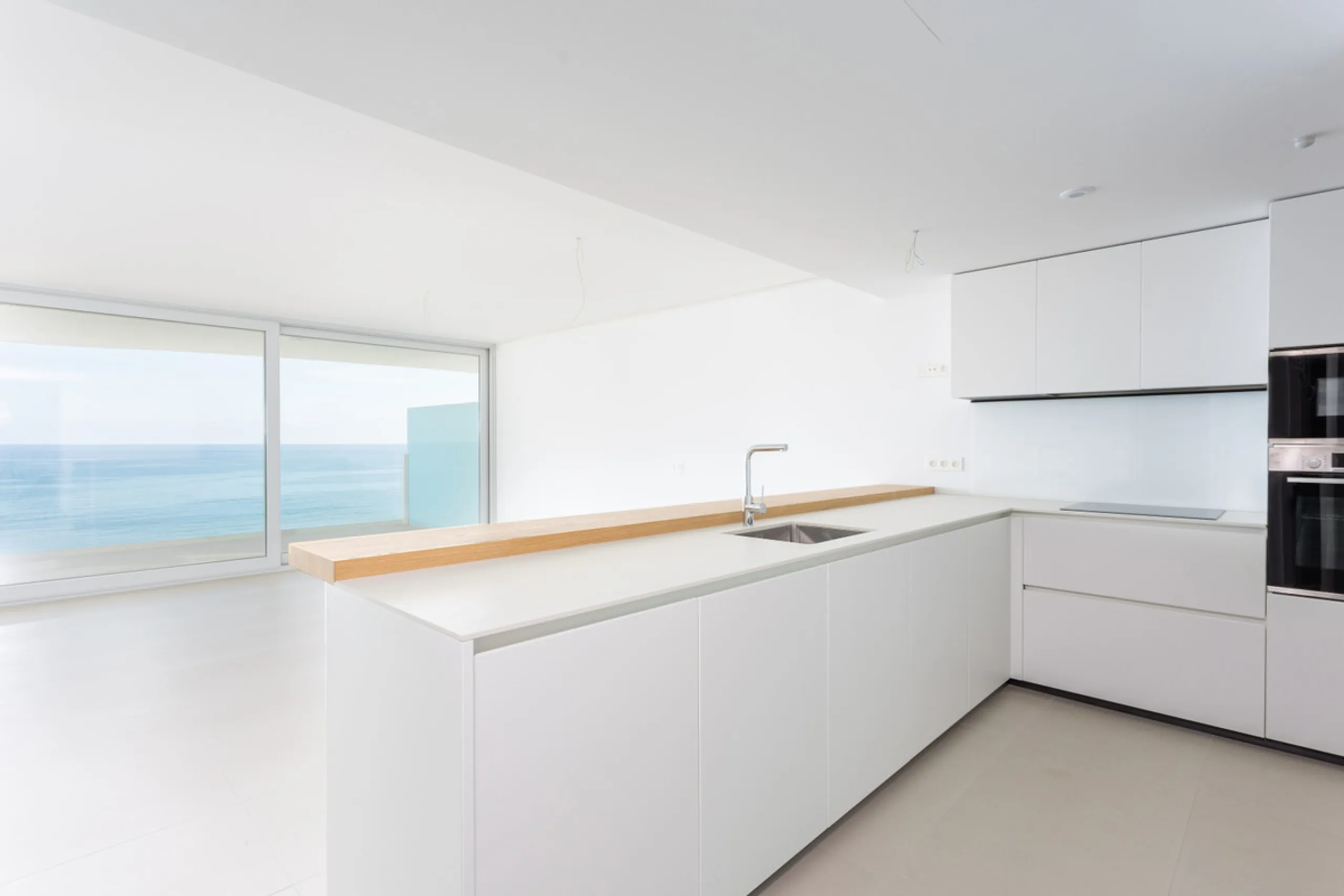 Would you like to live just few steps from the beach, feel the waves at your terrace and enjoy your own roof top solarium, look over the rooftops and feel the sea breeze? This exclusive penthouse apartment is located in one of the finest new builds called