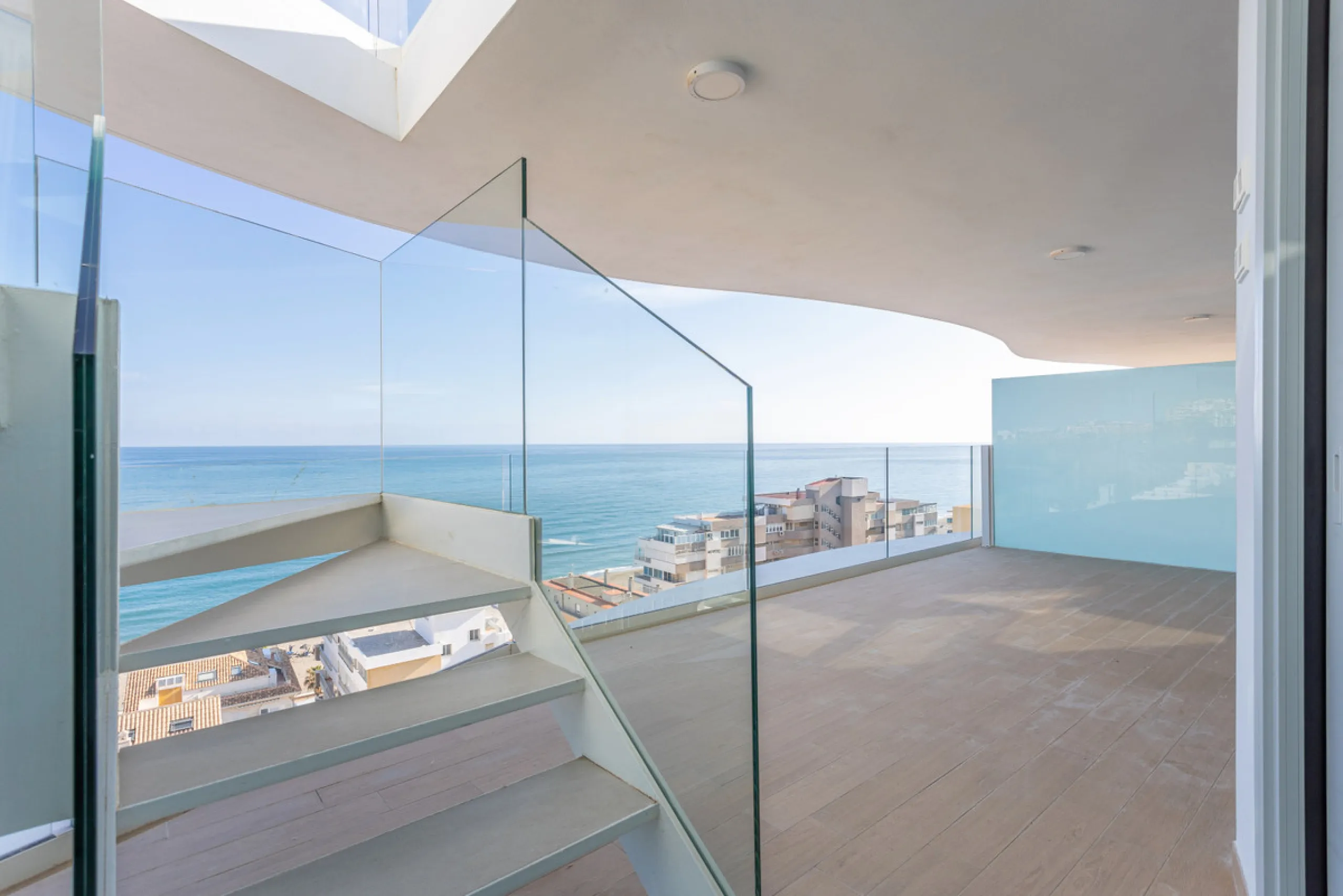 Would you like to live just few steps from the beach, feel the waves at your terrace and enjoy your own roof top solarium, look over the rooftops and feel the sea breeze? This exclusive penthouse apartment is located in one of the finest new builds called