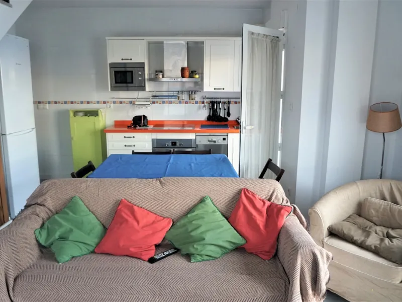 Beautiful duplex flat in first line beach, with wonderful views to the sea. It has an open plan kitchen, which opens onto a small balcony. It is next to the cosy living room. On the same floor there is a bathroom and a double bedroom, which also includes 