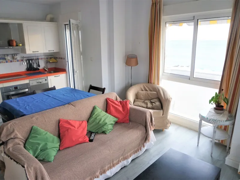 Beautiful duplex flat in first line beach, with wonderful views to the sea. It has an open plan kitchen, which opens onto a small balcony. It is next to the cosy living room. On the same floor there is a bathroom and a double bedroom, which also includes 