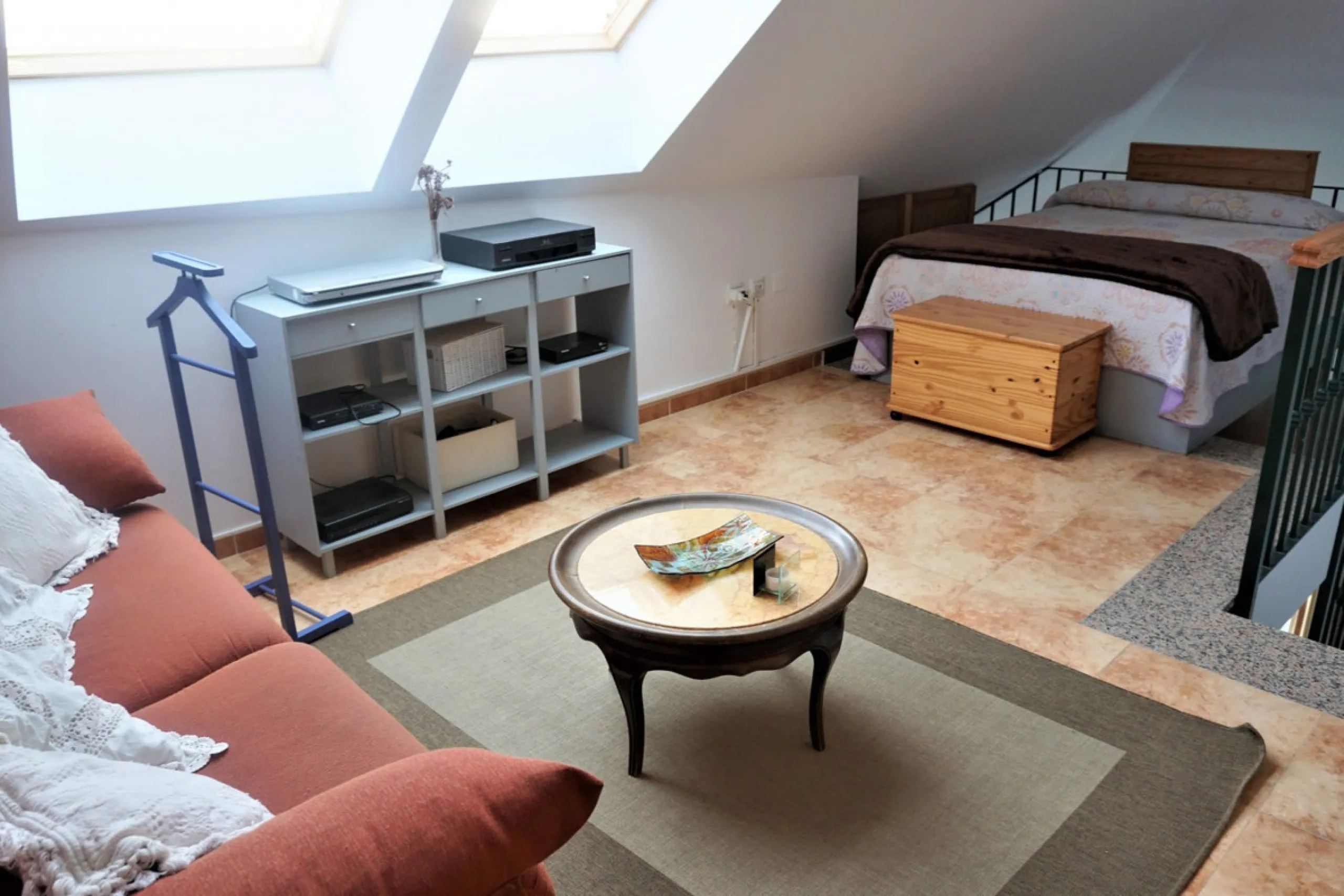 Beautiful duplex flat in first line beach, with wonderful views to the sea. It has an open plan kitchen, which opens onto a small balcony. It is next to the cosy living room. On the same floor there is a bathroom and a double bedroom, which also includes 