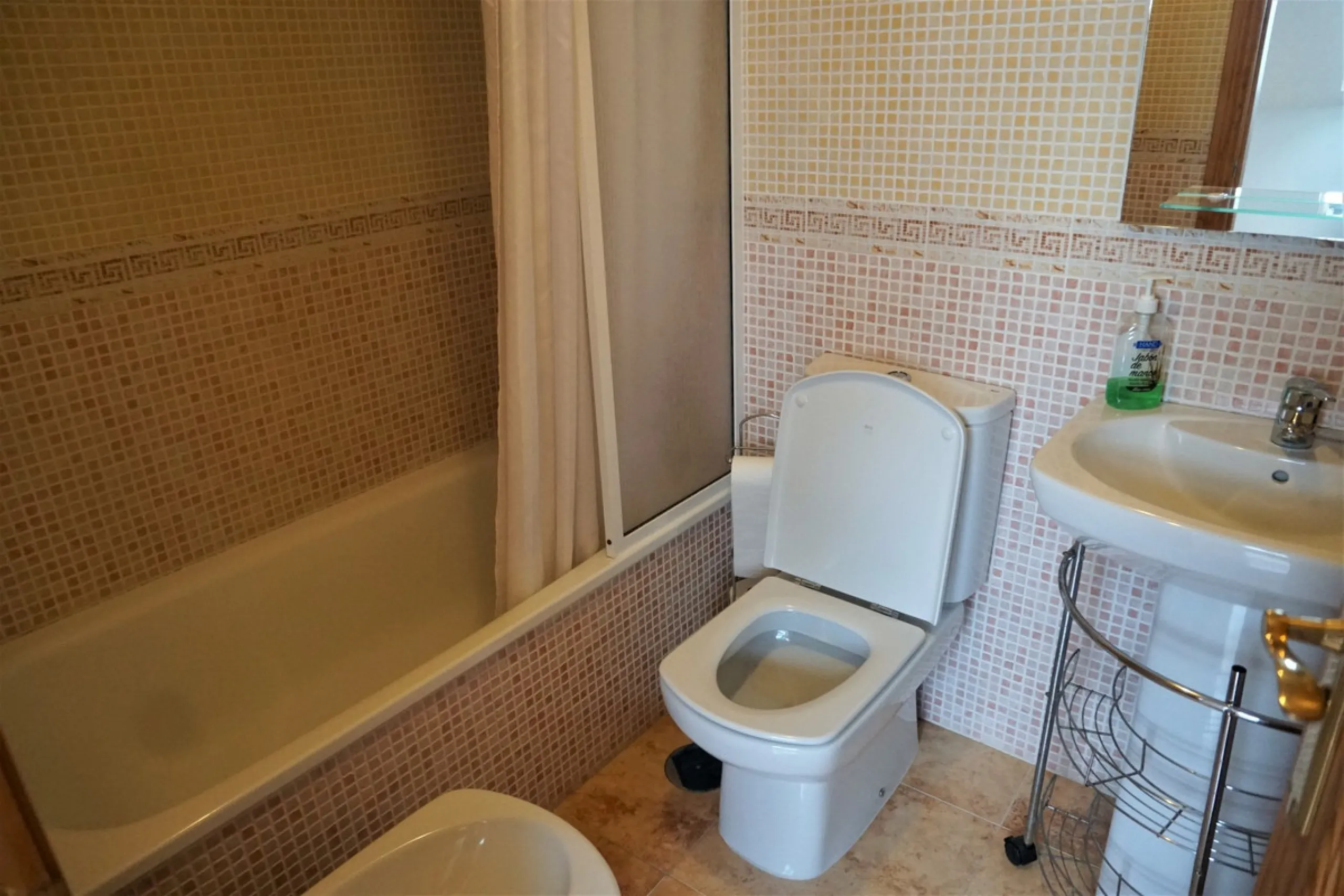 Beautiful duplex flat in first line beach, with wonderful views to the sea. It has an open plan kitchen, which opens onto a small balcony. It is next to the cosy living room. On the same floor there is a bathroom and a double bedroom, which also includes 