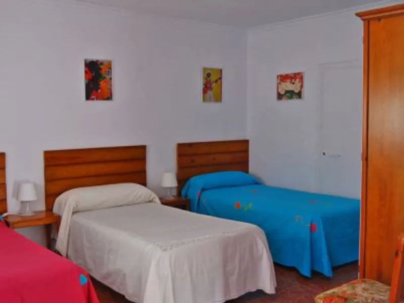 Andalusian Villa located on a plot of 12,000 square meters. With a 3000 m2 garden, mature with some trees over 100 years old, close to schools and shops, with easy access to the highway and close to Malaga airport.