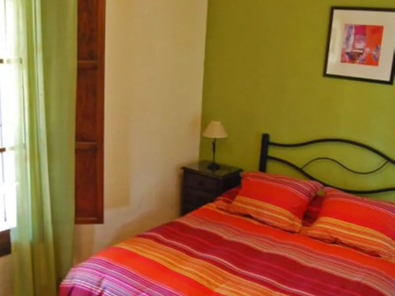 Andalusian Villa located on a plot of 12,000 square meters. With a 3000 m2 garden, mature with some trees over 100 years old, close to schools and shops, with easy access to the highway and close to Malaga airport.