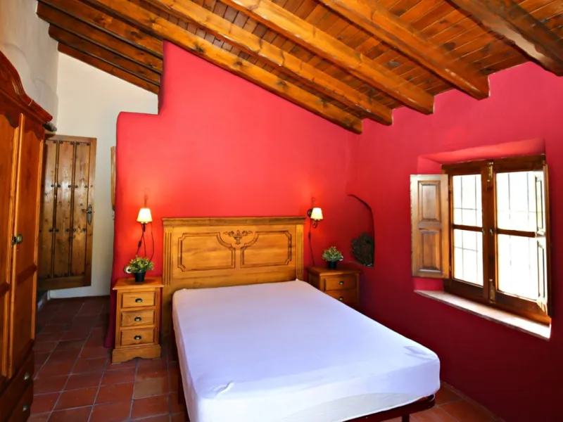 Exclusive and unique of its kind: a 16.000m2 Andalusian vacation resort with horse farm between Frigiliana and Nerja - with a built-up area of more than 1.600m2! In total, the resort has nine bedrooms, ten bathrooms and two guest toilets, spread over two 