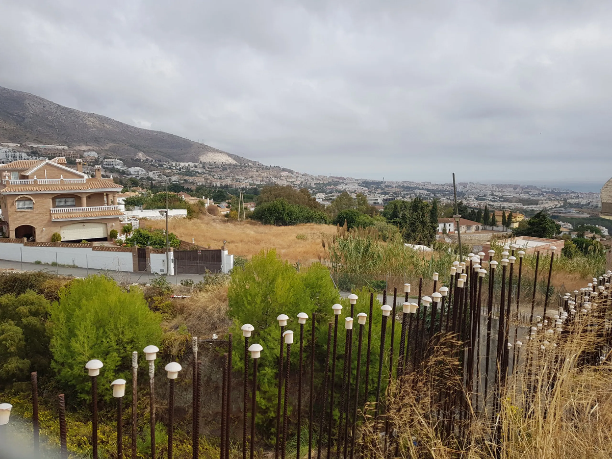Bank repossessed urban land designated for the construction of up to 22 single family homes or a two storey building situated in the centre of Benalmadena Pueblo.