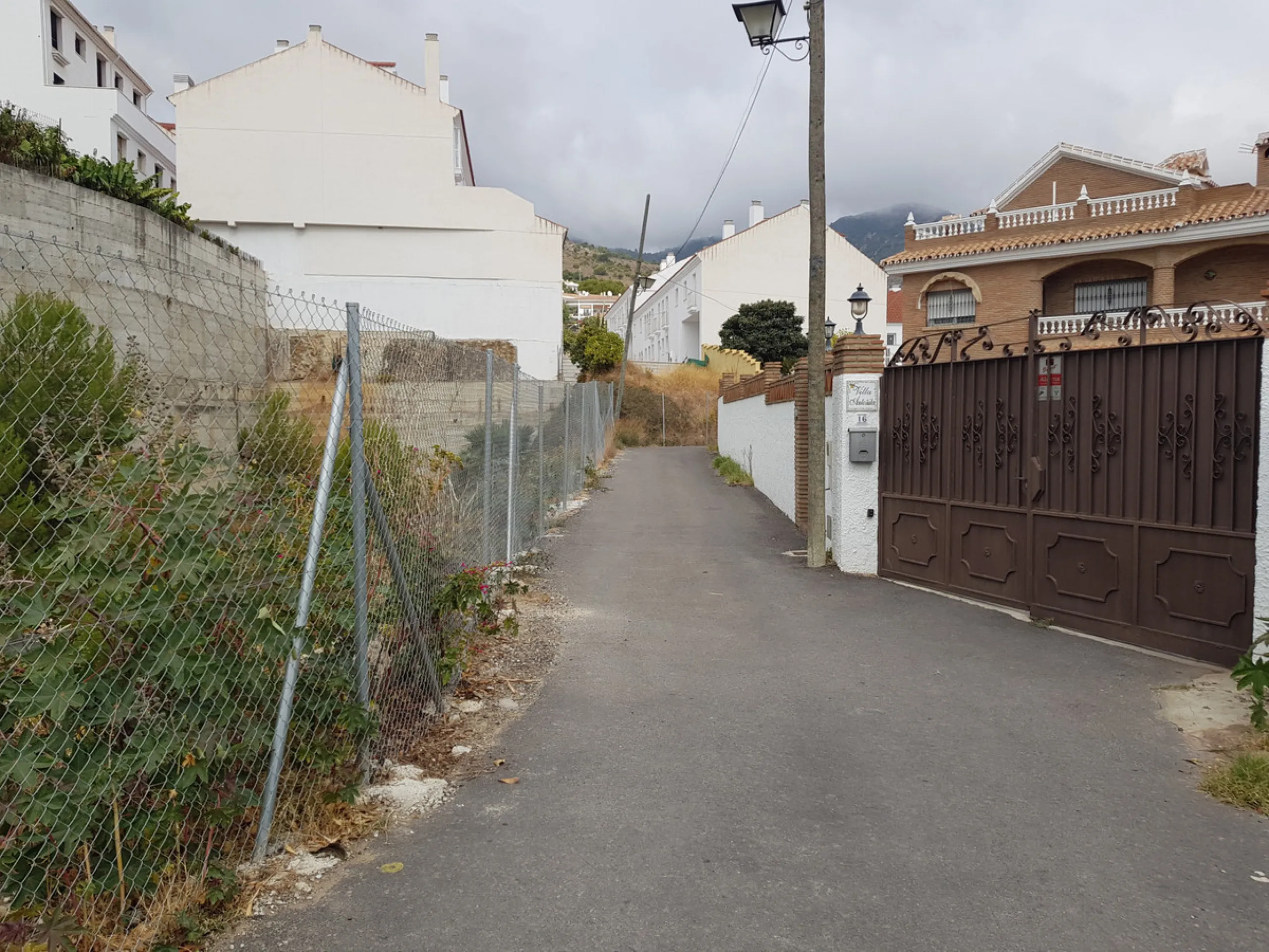Bank repossessed urban land designated for the construction of up to 22 single family homes or a two storey building situated in the centre of Benalmadena Pueblo.