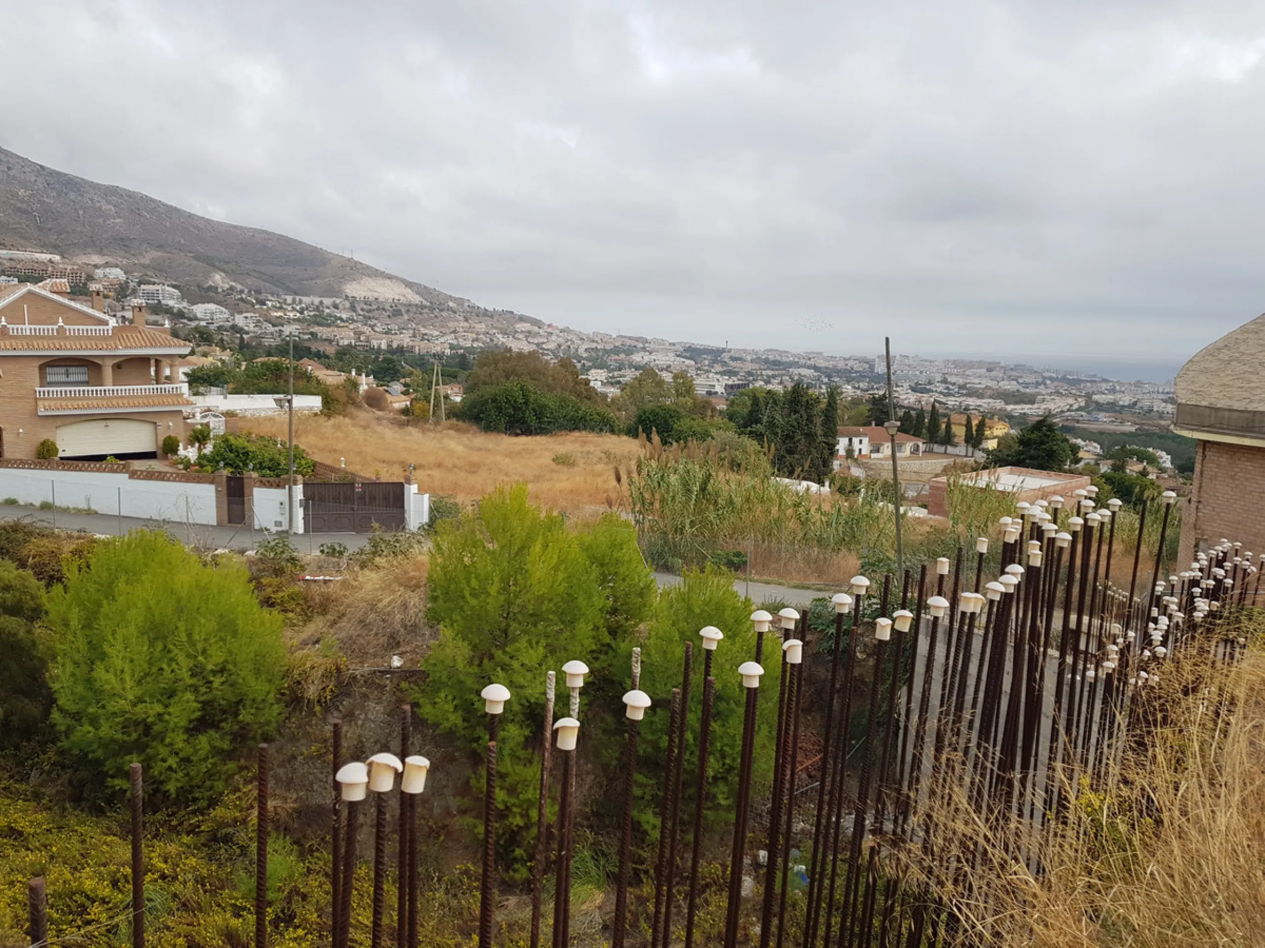 Bank repossessed urban land designated for the construction of up to 22 single family homes or a two storey building situated in the centre of Benalmadena Pueblo.
