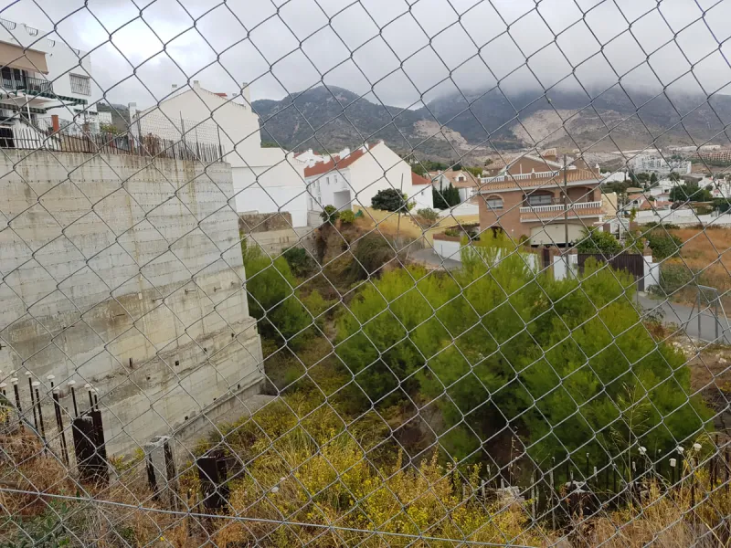 Bank repossessed urban land designated for the construction of up to 22 single family homes or a two storey building situated in the centre of Benalmadena Pueblo.