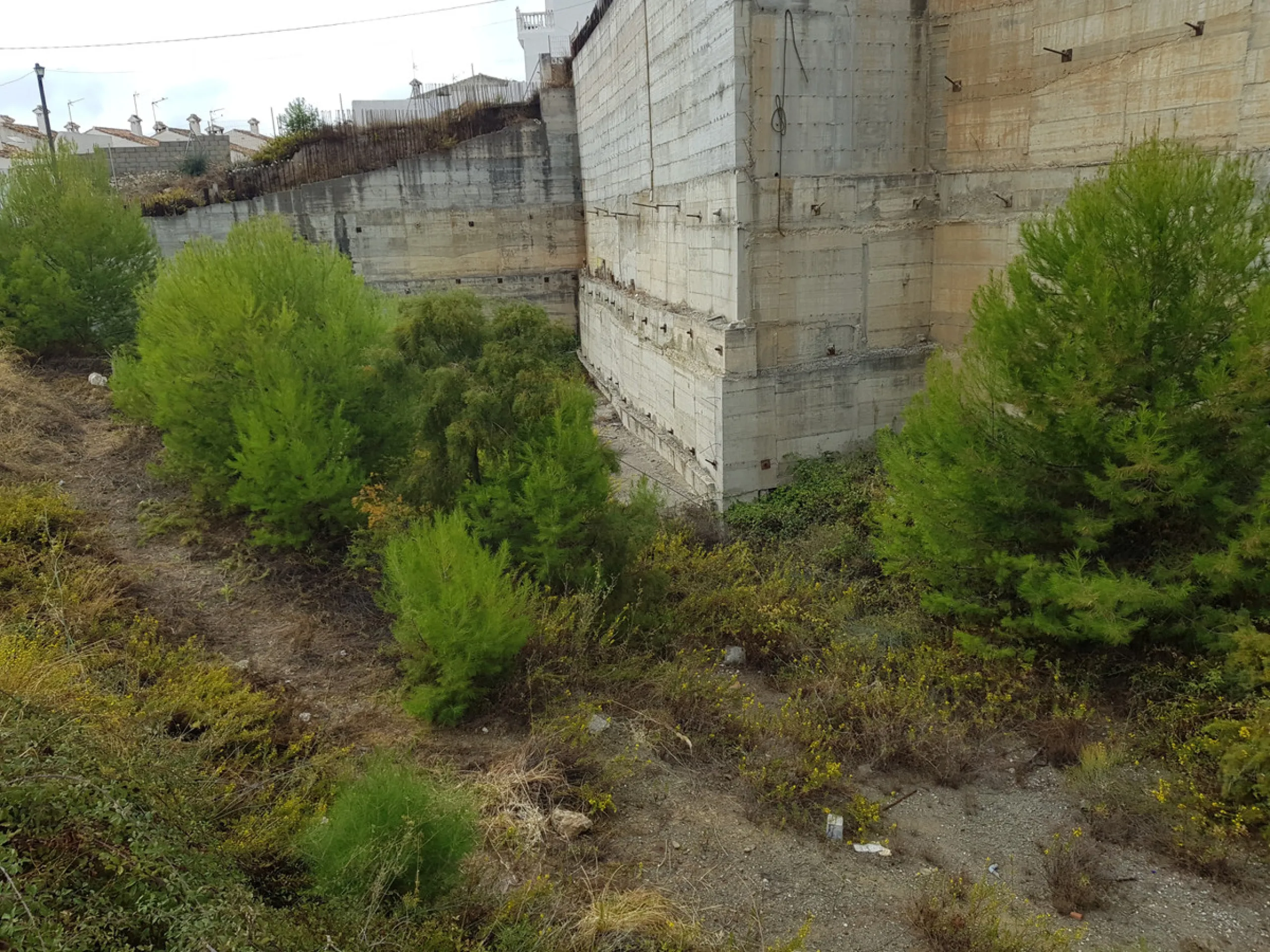 Bank repossessed urban land designated for the construction of up to 22 single family homes or a two storey building situated in the centre of Benalmadena Pueblo.