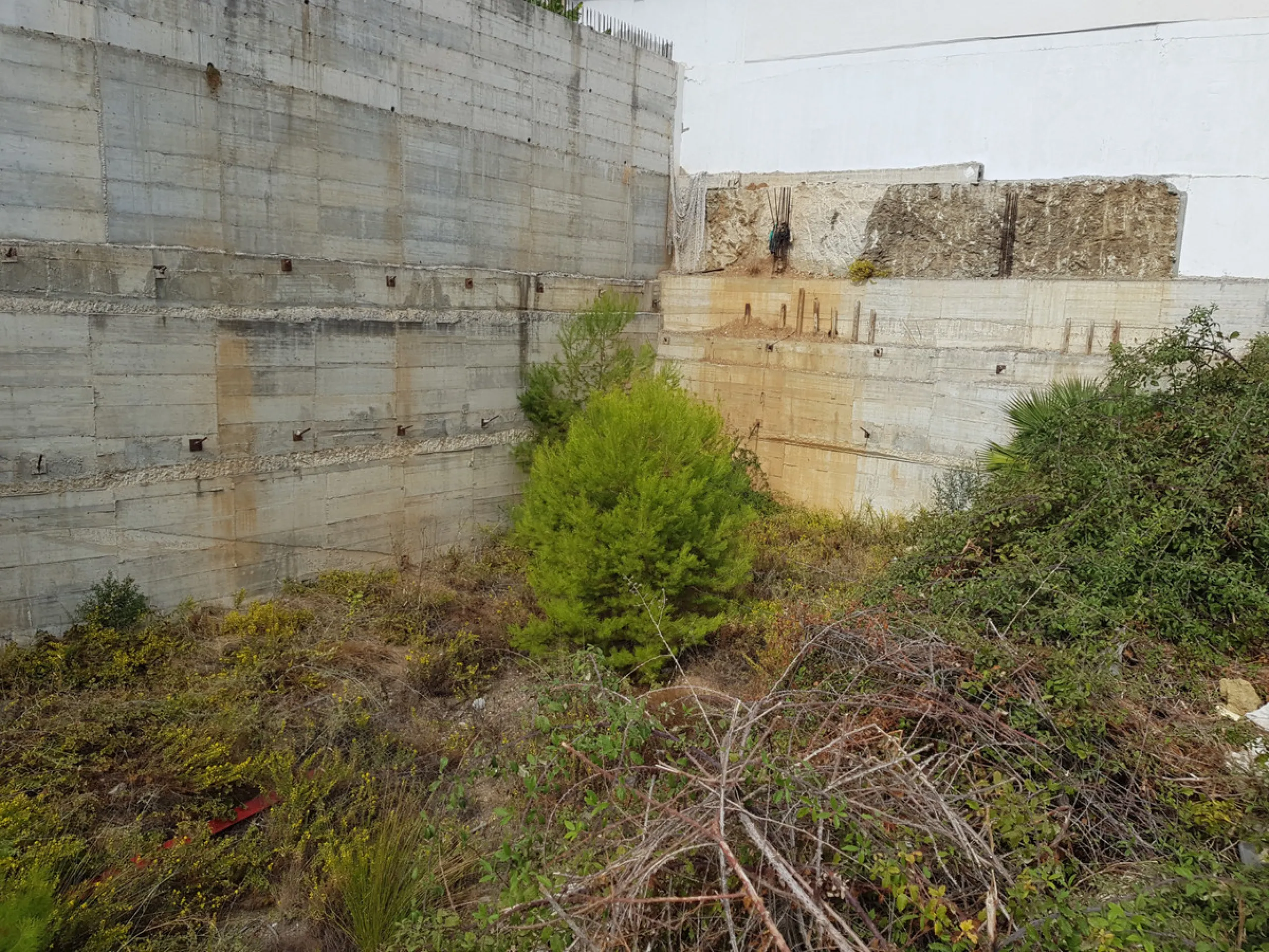 Bank repossessed urban land designated for the construction of up to 22 single family homes or a two storey building situated in the centre of Benalmadena Pueblo.