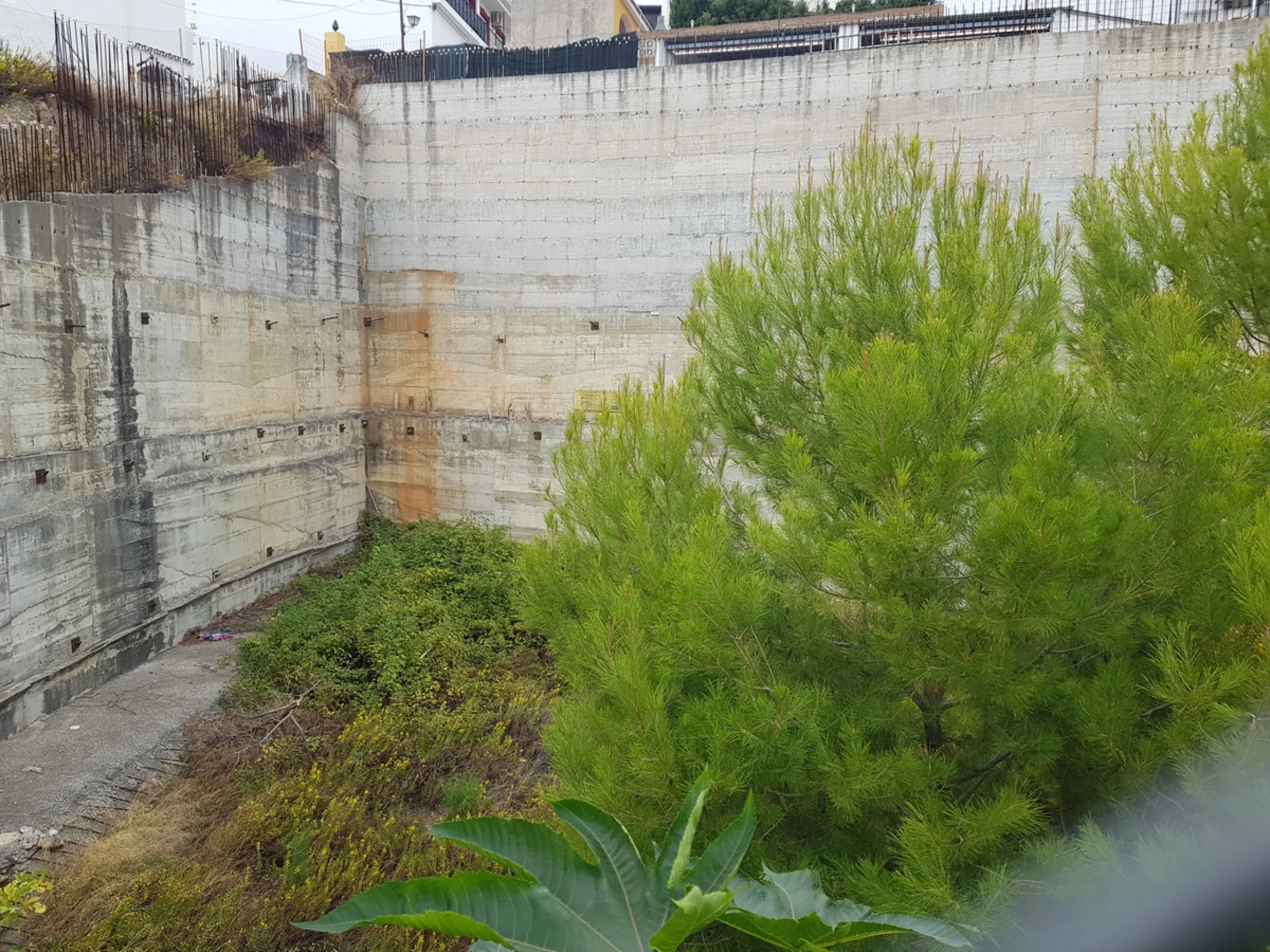 Bank repossessed urban land designated for the construction of up to 22 single family homes or a two storey building situated in the centre of Benalmadena Pueblo.