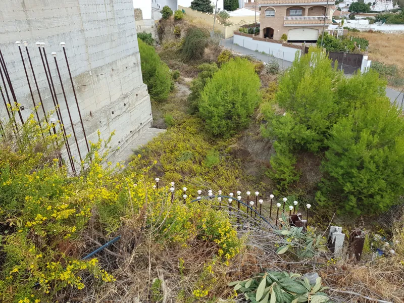 Bank repossessed urban land designated for the construction of up to 22 single family homes or a two storey building situated in the centre of Benalmadena Pueblo.