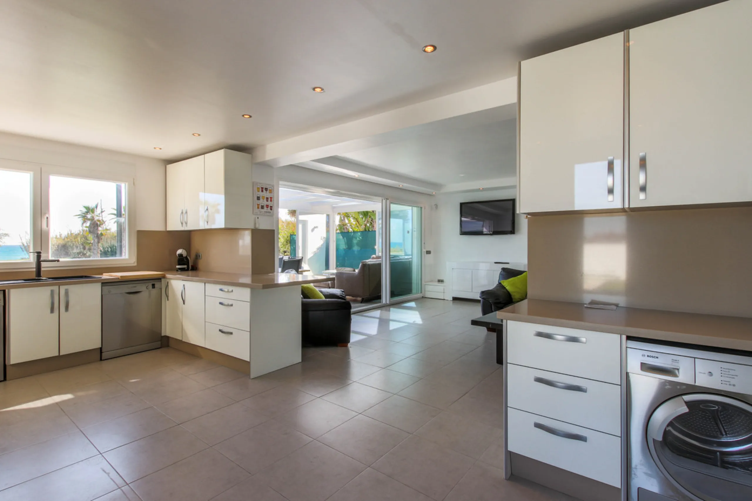 The property has a private, heated swimming pool which is positioned almost on the beach itself.  The gardens and pool have sunshine all day.