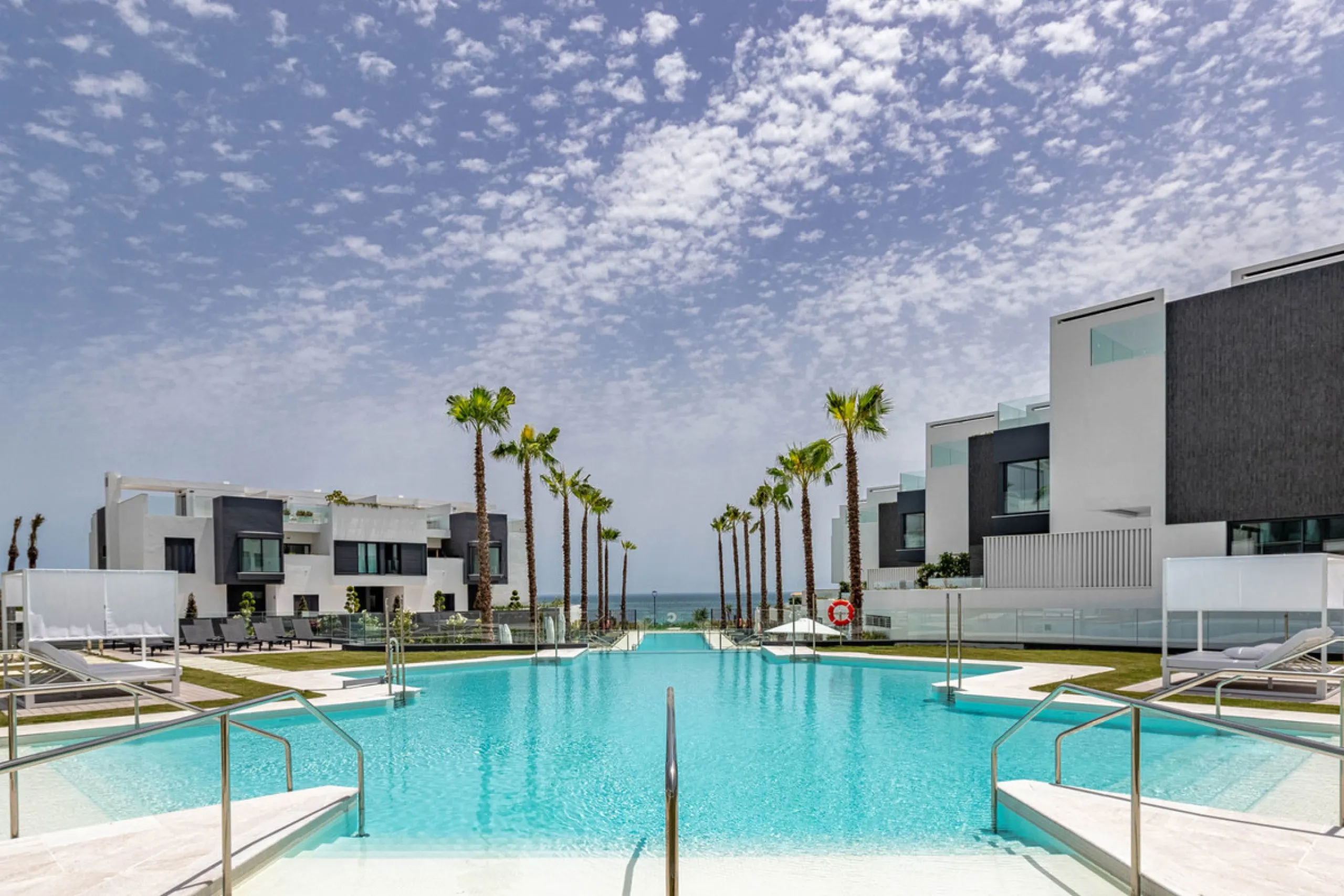 Experience luxury coastal living at The Islands, Estepona, an exclusive first-line beach urbanization offering direct access to the Mediterranean. This prestigious residential community combines modern architecture with elegant design, providing the perfe