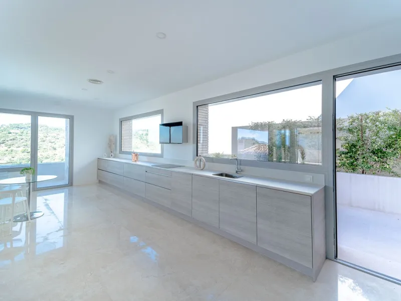 Newly built contemporary villa, finished on two floors plus basement, plus roof top, accessible by stairs and elevator. It is located in a natural environment, surrounded by golf and mountain, providing nice open views to those, panoramic sea view from th