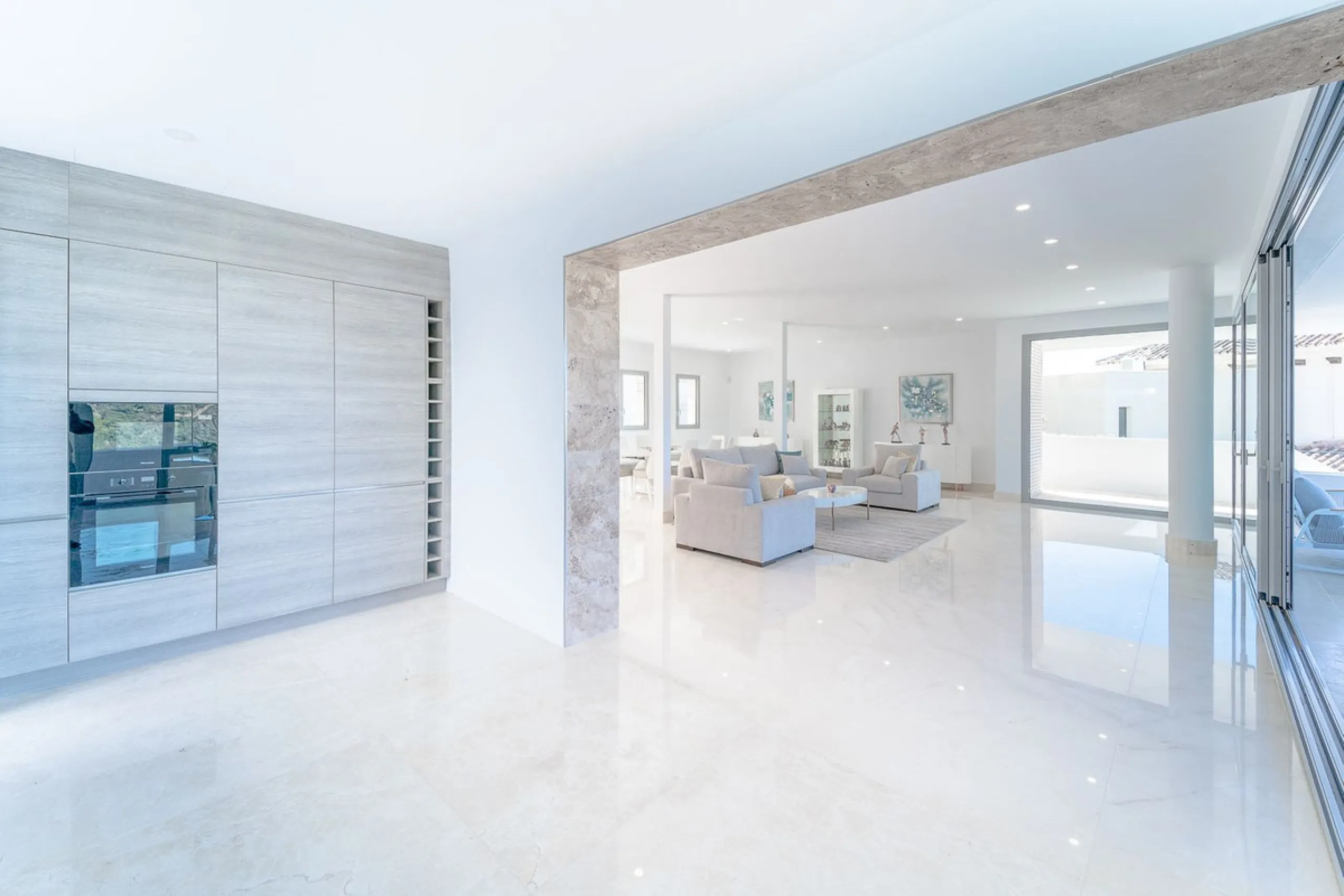 Newly built contemporary villa, finished on two floors plus basement, plus roof top, accessible by stairs and elevator. It is located in a natural environment, surrounded by golf and mountain, providing nice open views to those, panoramic sea view from th